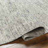 The simplistic yet compelling rugs from the Hamburg Collection effortlessly serve as the exemplar representation of modern decor. These Hand Loomed pieces are exquisitely crafted and offer natural class and grace to your decor space. Made with Wool in India, and has Low Pile. Spot Clean Only, One Year Limited Warranty.Hand Loome Amethyst Home provides interior design, new home construction design consulting, vintage area rugs, and lighting in the Dallas metro area.