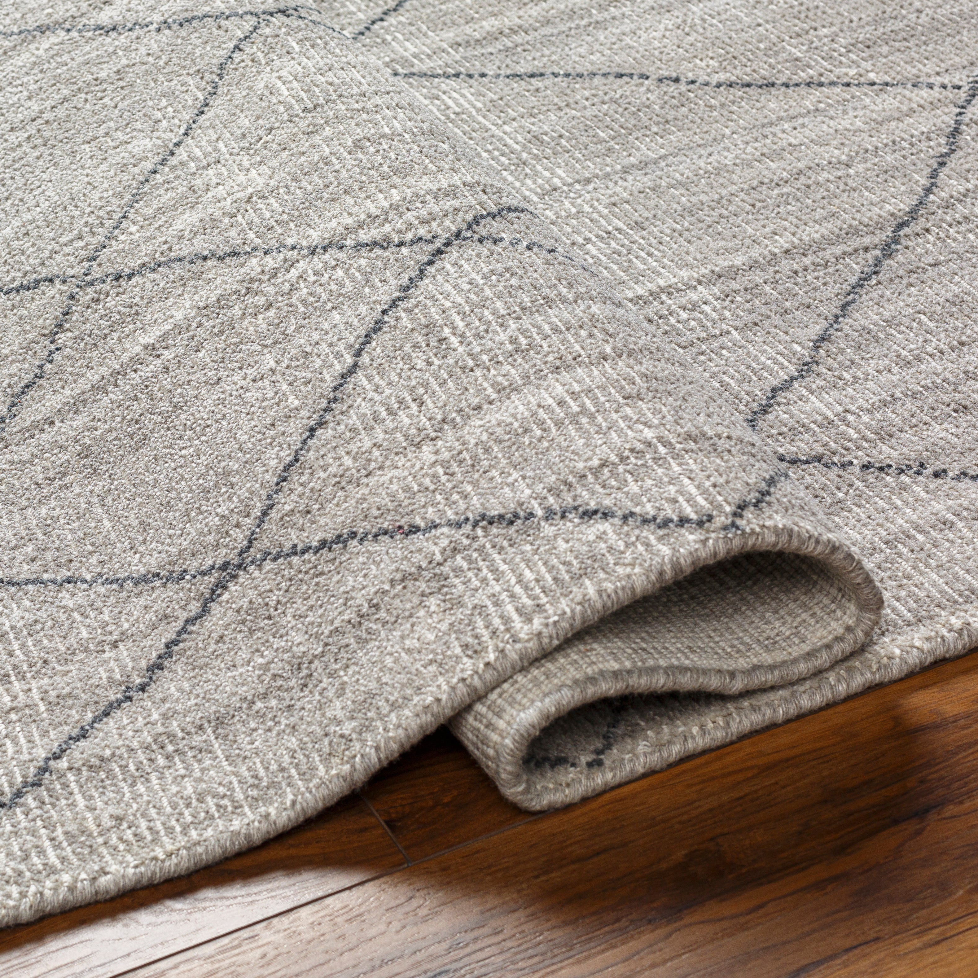 The Highland Collection features compelling global inspired designs brimming with elegance and grace! The perfect addition for any home, these pieces will add eclectic charm to any room! These Hand Loomed pieces are exquisitely crafted and offer natural class and grace to your decor space. Made with Recycled PET Yarn in India, and has Low Pile. Spot Clean Only, One Year Limited Warranty. Amethyst Home provides interior design, new construction, custom furniture, and rugs for Portland metro area