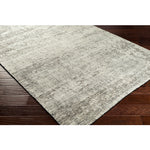 Featuring Malaga Archer Hand-Knotted Rug by Surya at Amethyst Home. The simplistic yet compelling rugs from the Malaga Archer effortlessly serve as the exemplar representation of modern decor. With their Hand-Knotted construction, these rugs provide a durability that can not be found in other handmade constructions, and boasts the ability to be thorough. Amethyst Home provides interior design, new home construction design consulting, vintage area rugs, and lighting in the Winter Garden metro area.