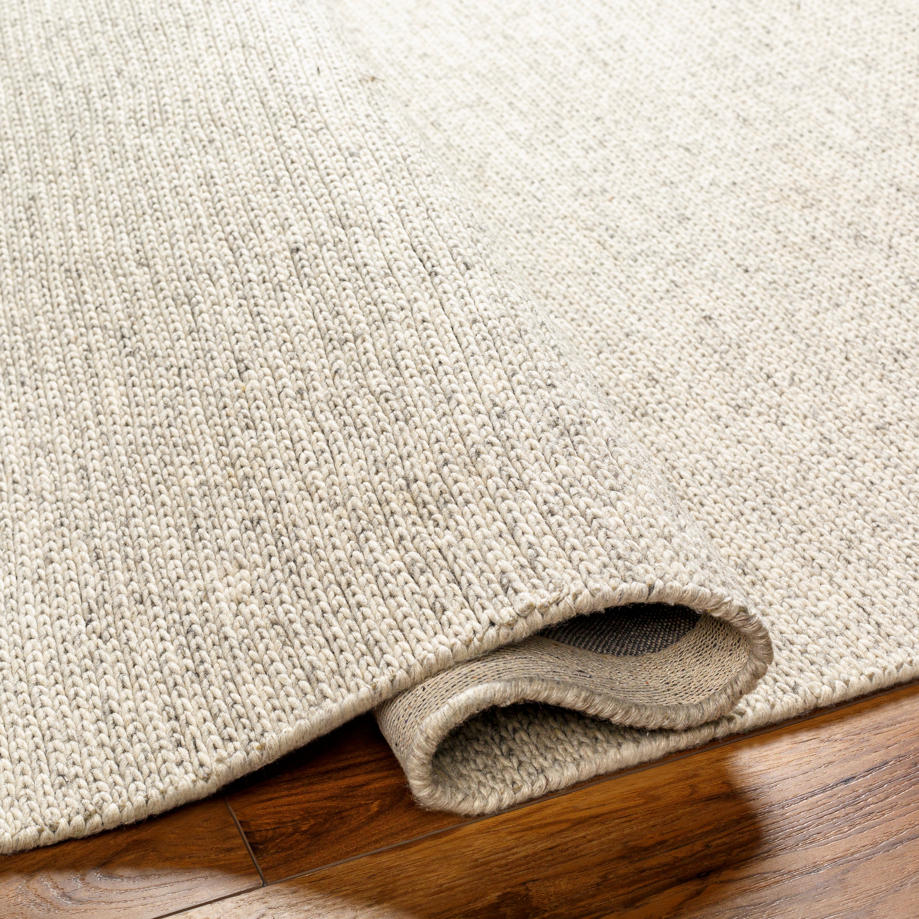 Featuring Mia Rug by Surya at Amethyst Home. The simplistic yet compelling rugs from the Mia Collection effortlessly serve as the exemplar representation of modern decor. The meticulously woven construction of these pieces boasts durability and will provide natural charm into your decor space. Made with Wool in India, and has No Pile. Spot Clean Only, One Year Limited Warranty.
Hand Woven. Amethyst Home provides interior design, new construction, custom furniture, and rugs for Charlotte metro area