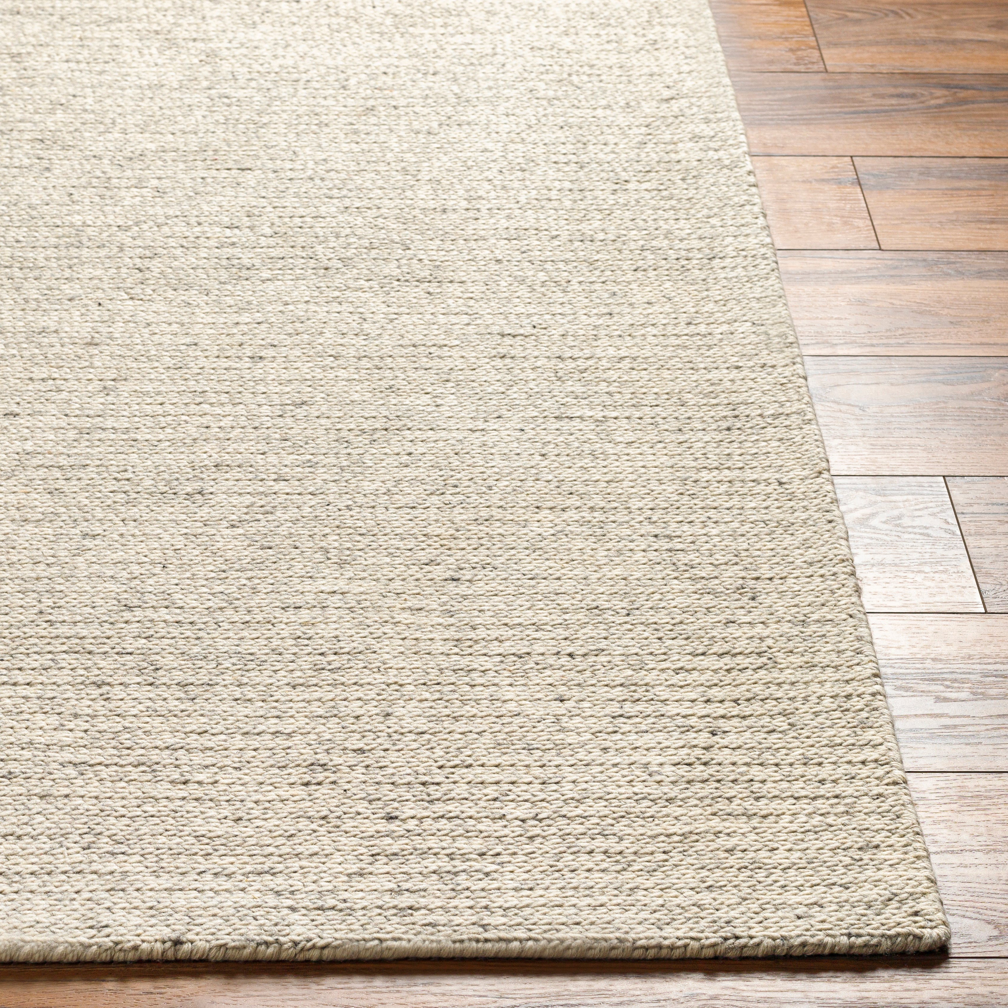 Featuring Mia Rug by Surya at Amethyst Home. The simplistic yet compelling rugs from the Mia Collection effortlessly serve as the exemplar representation of modern decor. The meticulously woven construction of these pieces boasts durability and will provide natural charm into your decor space. Made with Wool in India, and has No Pile. Spot Clean Only, One Year Limited Warranty.
Hand WovenWo. Amethyst Home provides interior design, new construction, custom furniture, and rugs for Houston metro area