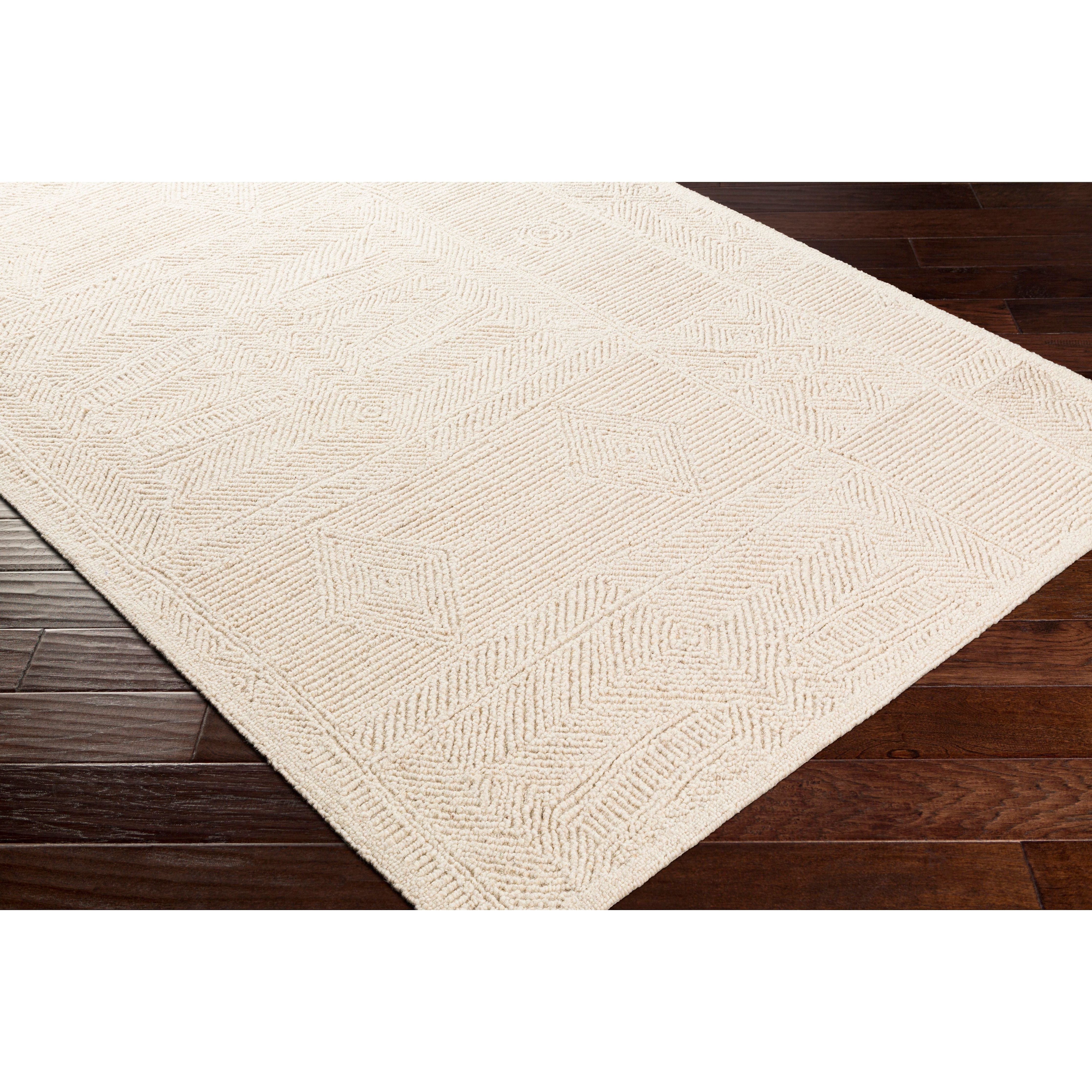 Featuring Newcastle Rug by Surya at Amethyst Home. The Newcastle Collection features compelling global inspired designs brimming with elegance and grace! The perfect addition for any home, these pieces will add eclectic charm to any room! With their hand tufted construction, these rugs offer an affordable alternative to other handmade constructions while pr.  Amethyst Home provides interior design, new home construction design consulting, vintage area rugs, and lighting in the Portland metro area.