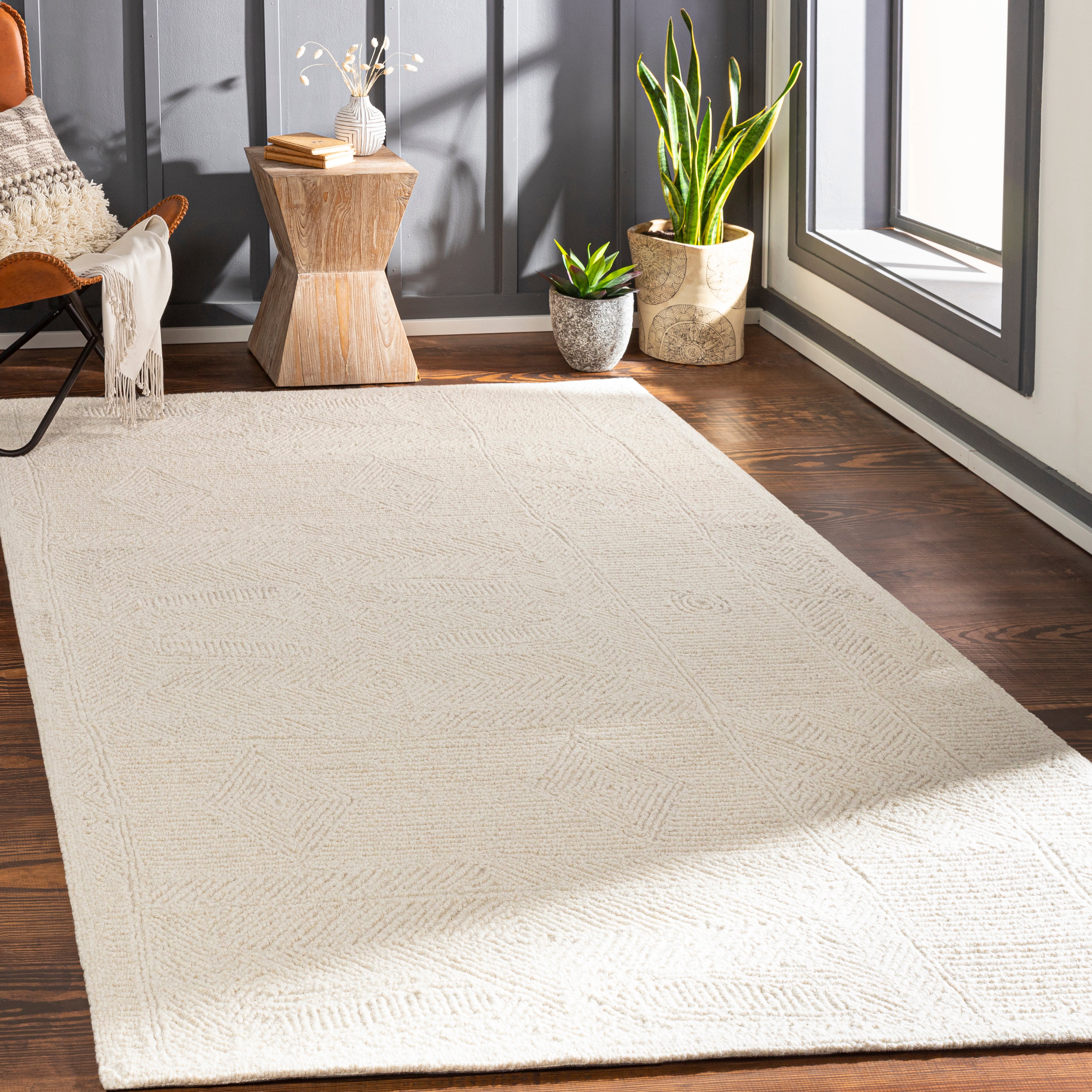 Featuring Newcastle Rug by Surya at Amethyst Home. The Newcastle Collection features compelling global inspired designs brimming with elegance and grace! The perfect addition for any home, these pieces will add eclectic charm to any room! With their hand tufted construction, these rugs offer an affordable alternative to other handmade constructions while p.  Amethyst Home provides interior design, new home construction design consulting, vintage area rugs, and lighting in the Charlotte metro area.