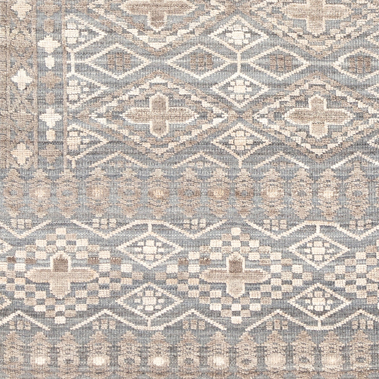 Add an elegant touch to any space with this hand-knotted Nobility Taupe / Charcoal  Rug. Its blend of wool and viscose is ultra soft and smooth, while its timeless ornate motif with modern lines create an exquisite, timeless piece. Enjoy its high-low characteristics and luxurious feel to add a touch of sophistication to your home that fits any lifestyle. Amethyst Home provides interior design, new construction, custom furniture, and area rugs in the Charlotte metro area