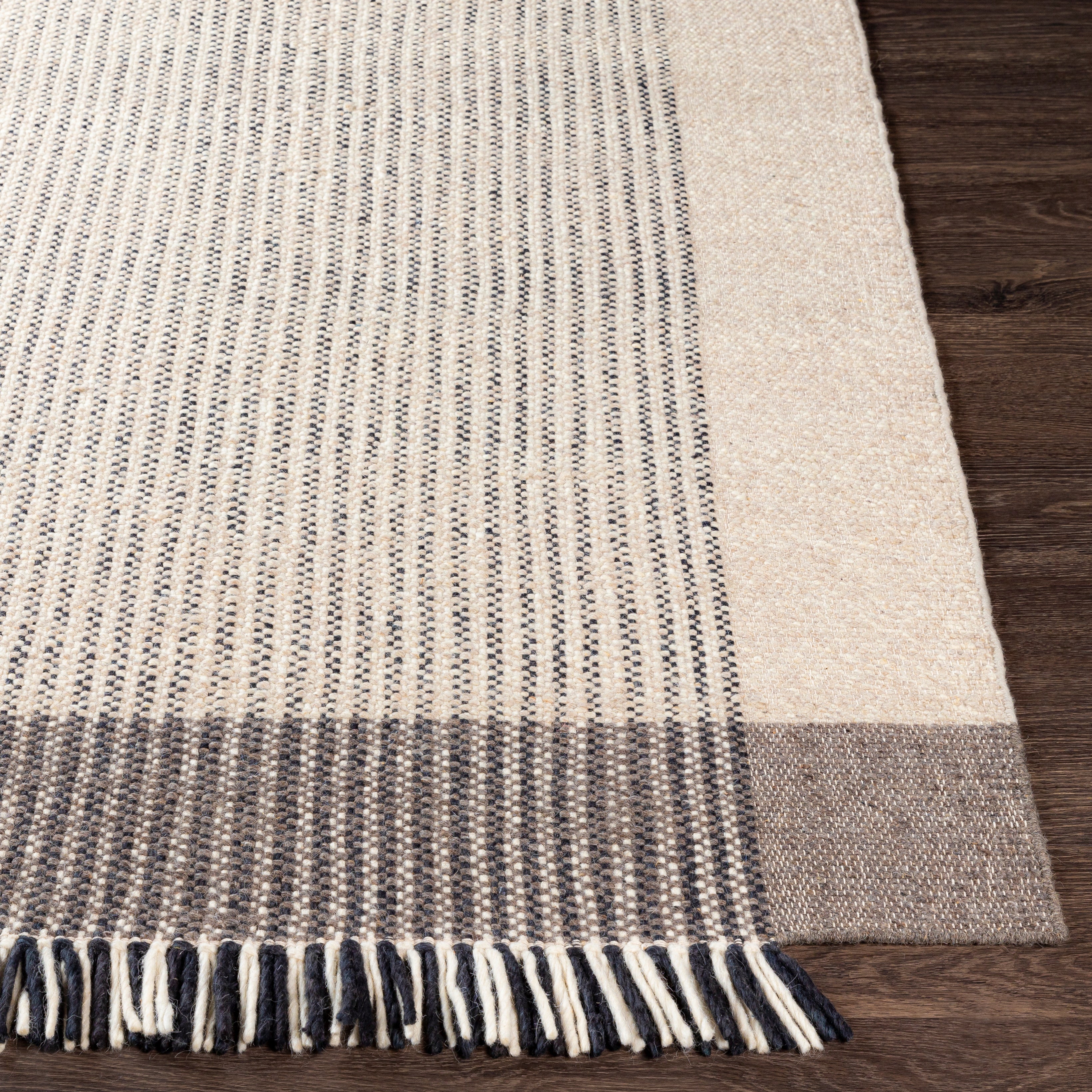 Featuring Reliance Walker Rug by Surya at Amethyst Home. Fashioning a sense of warmth that will radiate comfy vibes throughout your space, the Reliance Walker offers rustic inspired charm will transform your decor space and be the envy of your guests! The meticulously woven construction of these pieces boasts durability and will provide natural charm into your decor space. Mad. Amethyst Home provides interior design, new construction, custom furniture, and area rugs in the Winter Garden metro area