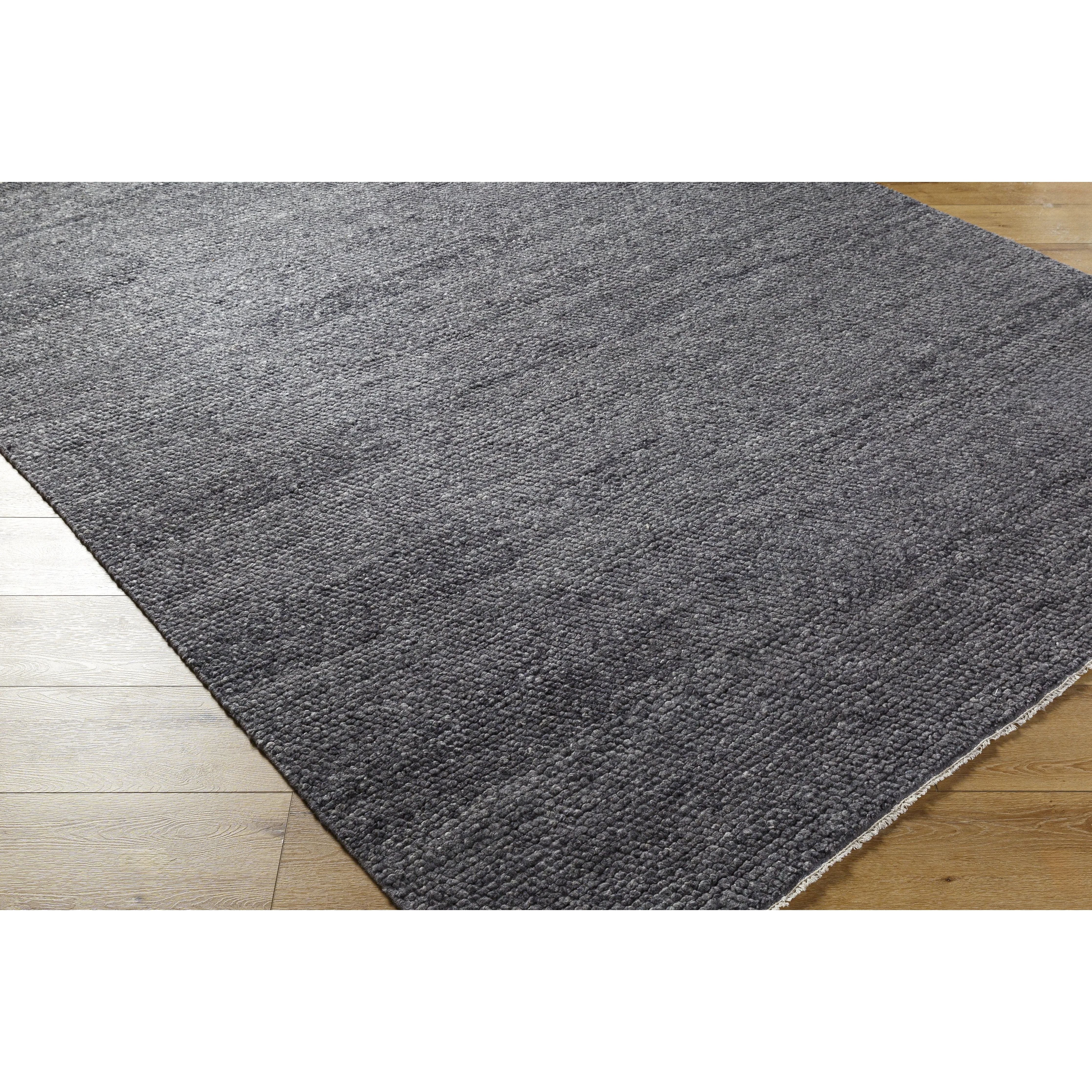 Featuring Wabi Black Hand-Knotted Rug by Surya at Amethyst Home. Experience the beauty of the Wabi Black Hand-Knotted Rug in your home. Crafted with a unique design, this piece will bring a touch of elegance and style to any room. Its luxurious texture and classic black hue will ensure a timeless look for years to come!
100% WoolHand Knotted Low PileThick. Amethyst Home provides interior design, new home construction design consulting, vintage area rugs, and lighting in the Los Angeles metro area.