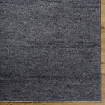 Featuring Wabi Black Hand-Knotted Rug by Surya at Amethyst Home. Experience the beauty of the Wabi Black Hand-Knotted Rug in your home. Crafted with a unique design, this piece will bring a touch of elegance and style to any room. Its luxurious texture and classic black hue will ensure a timeless look for years to come!
100% WoolHand Knotted Low PileThickn. Amethyst Home provides interior design, new home construction design consulting, vintage area rugs, and lighting in the Washington metro area.