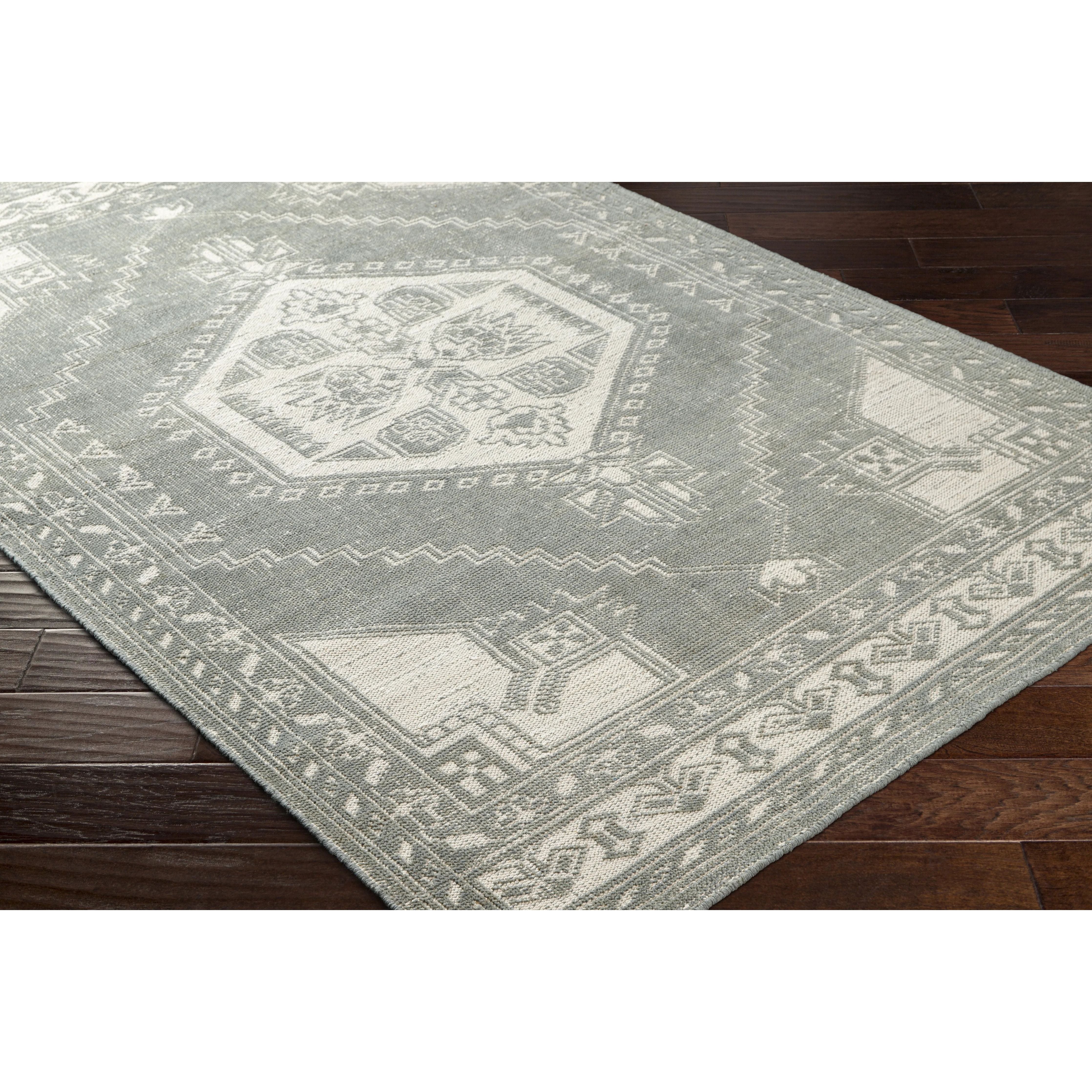 Featuring Zahra Charcoal Hand-Knotted Rug by Surya at Amethyst Home. The Zahra Collection showcases traditional inspired designs that exemplify timeless styles of elegance, comfort, and sophistication. With their hand knotted construction, these rugs provide a durability that can not be found in other handmade constructions, and boasts the ability to be. Amethyst Home provides interior design, new home construction design consulting, vintage area rugs, and lighting in the Newport Beach metro area.