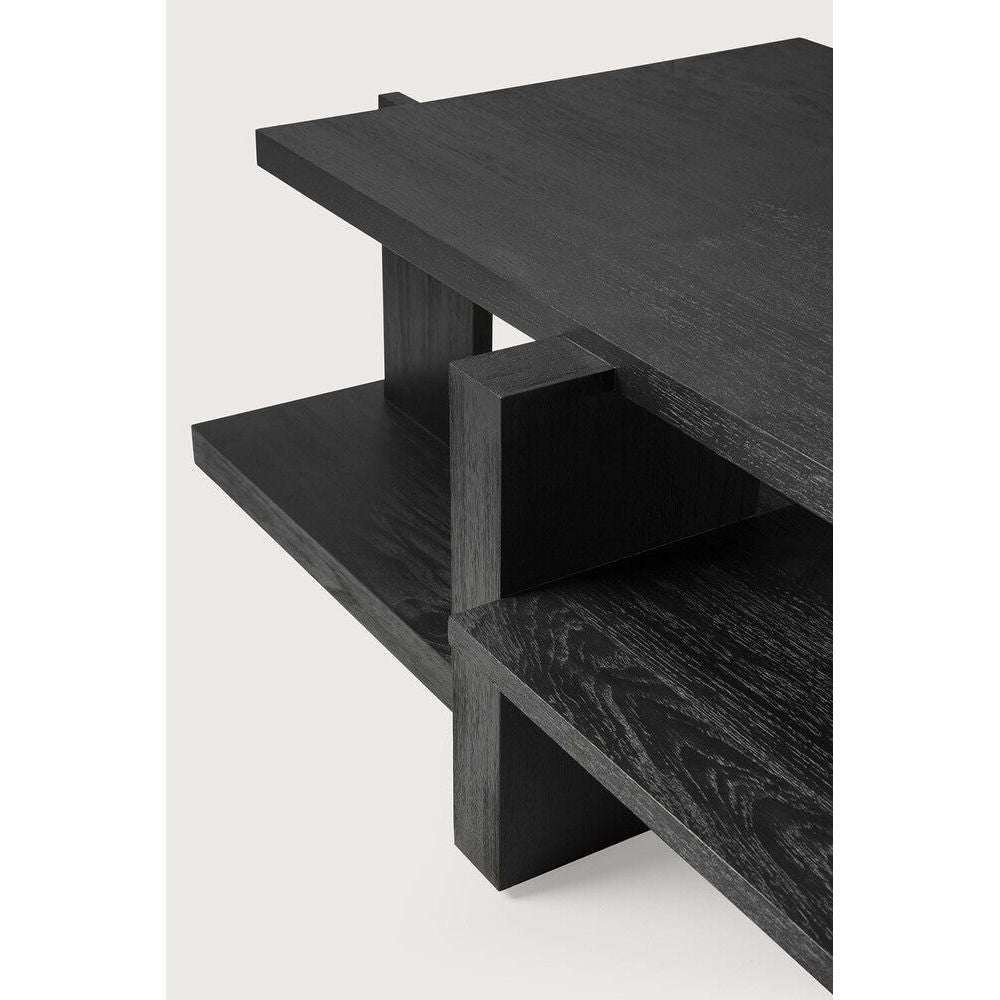 Inspired by the Dutch architectural movement de Stijl, the Teak Abstract Coffee Table is not only centered around style but also purpose. With its contemporary black finish discover new proportions and interest from every angle. Amethyst Home provides interior design services, furniture, rugs, and lighting in the Washington metro area.