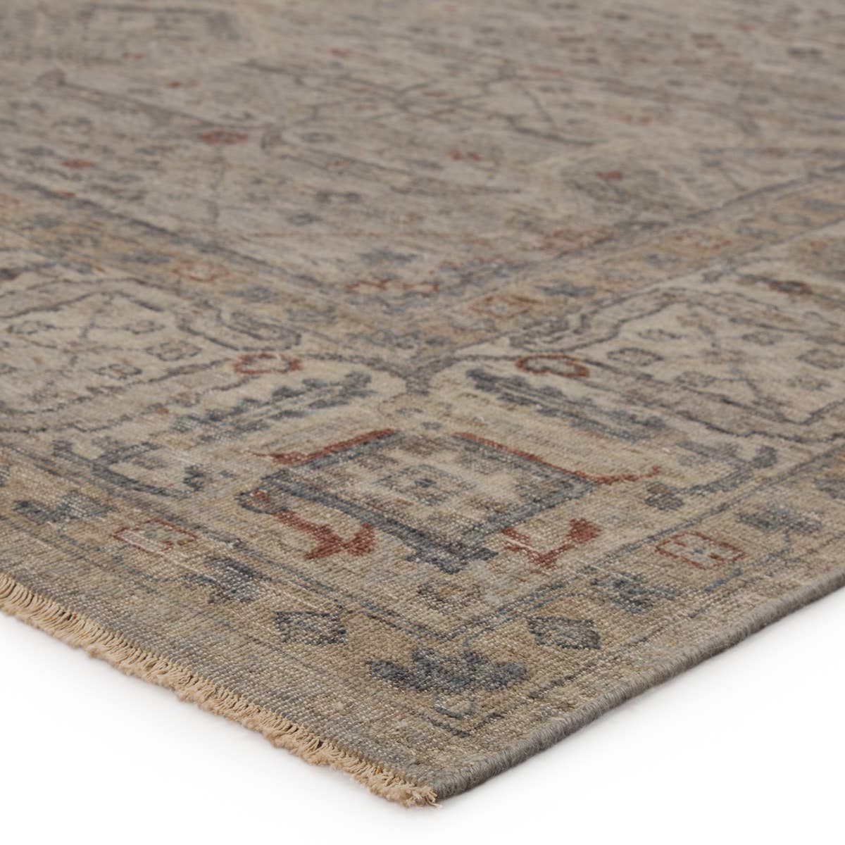 The Tierzah Maison Area Rug by Jaipur Living, or TRZ04, boasts a Persian knot construction and neutral beige, taupe, and gray palette with rich hints of terracotta. This artisan-made rug features fringe trimmed details for a touch of global charm. This is perfect for your bedroom or other medium traffic area. 