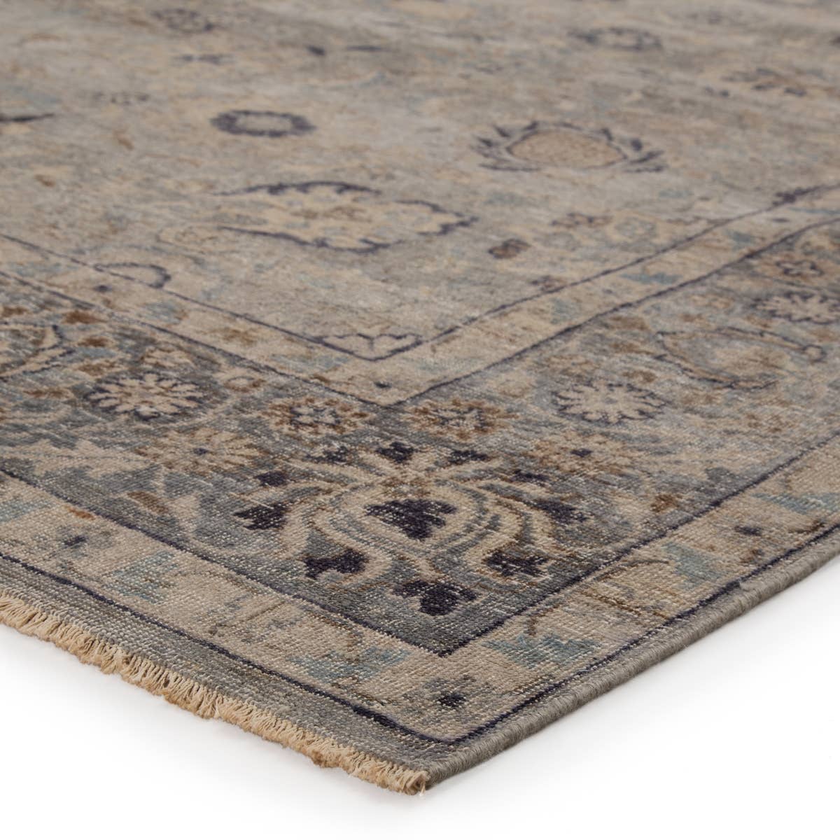 The Tierzah Sahlest Area Rug by Jaipur Living, or TRZ03, boasts a Persian knot construction and tonal gray, beige, and charcoal palette that grounds any space. This artisan-made rug features fringe trimmed details for a touch of global charm. This is perfect for your living room, bedroom, or other medium traffic area. 