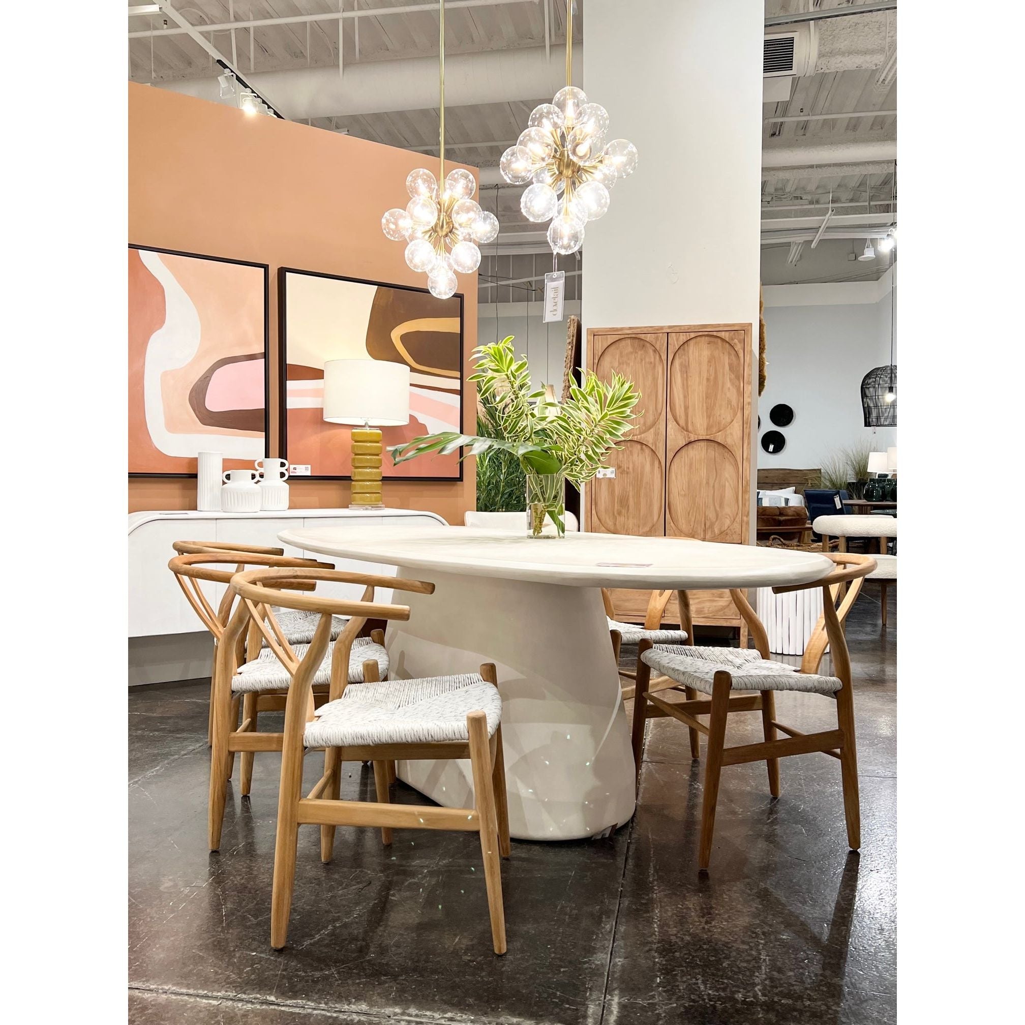 Featuring Turell Dining Table by Dovetail at Amethyst Home. Sleek and modern, we love how the curves of the Turell Dining Table welcome you to grab a seat. We can picture enjoying both casual and formal dinners alike at this beautifully structured dining table.
 Material: Lightweight ConcreteFinish: Ivory FinishWidth: 91 inDepth: 39 inHeight: 30 inVolume: 61.8 cu ftWeight: 319 lbs. Amethyst Home provides interior design services, furniture, rugs, and lighting in the Omaha metro area.