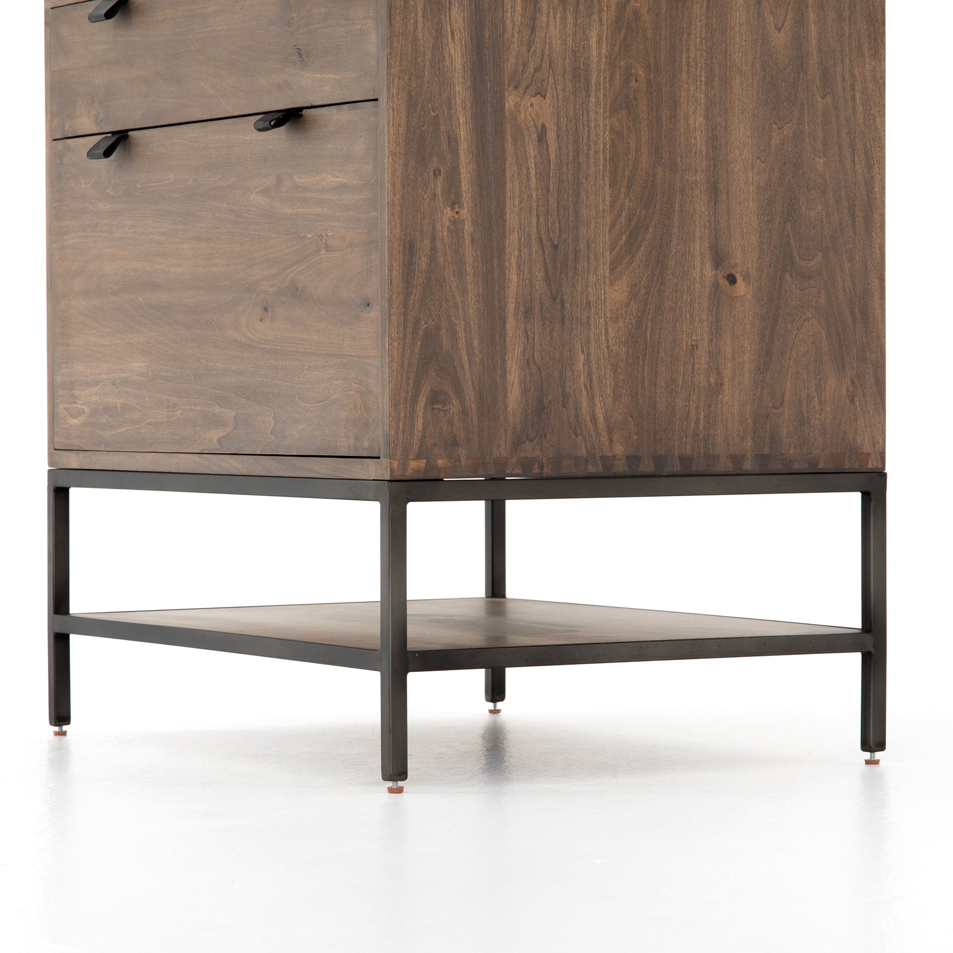 Inspired by clean mid-century design, the Trey Modular Filing Cabinet offers plenty of extra desk storage space. The cabinet is available in two colors, Auburn Poplar and a Black Wash Poplar. Metal-secured leather pulls add a textural element of surprise. Great solo or paired with matching desk or credenza.