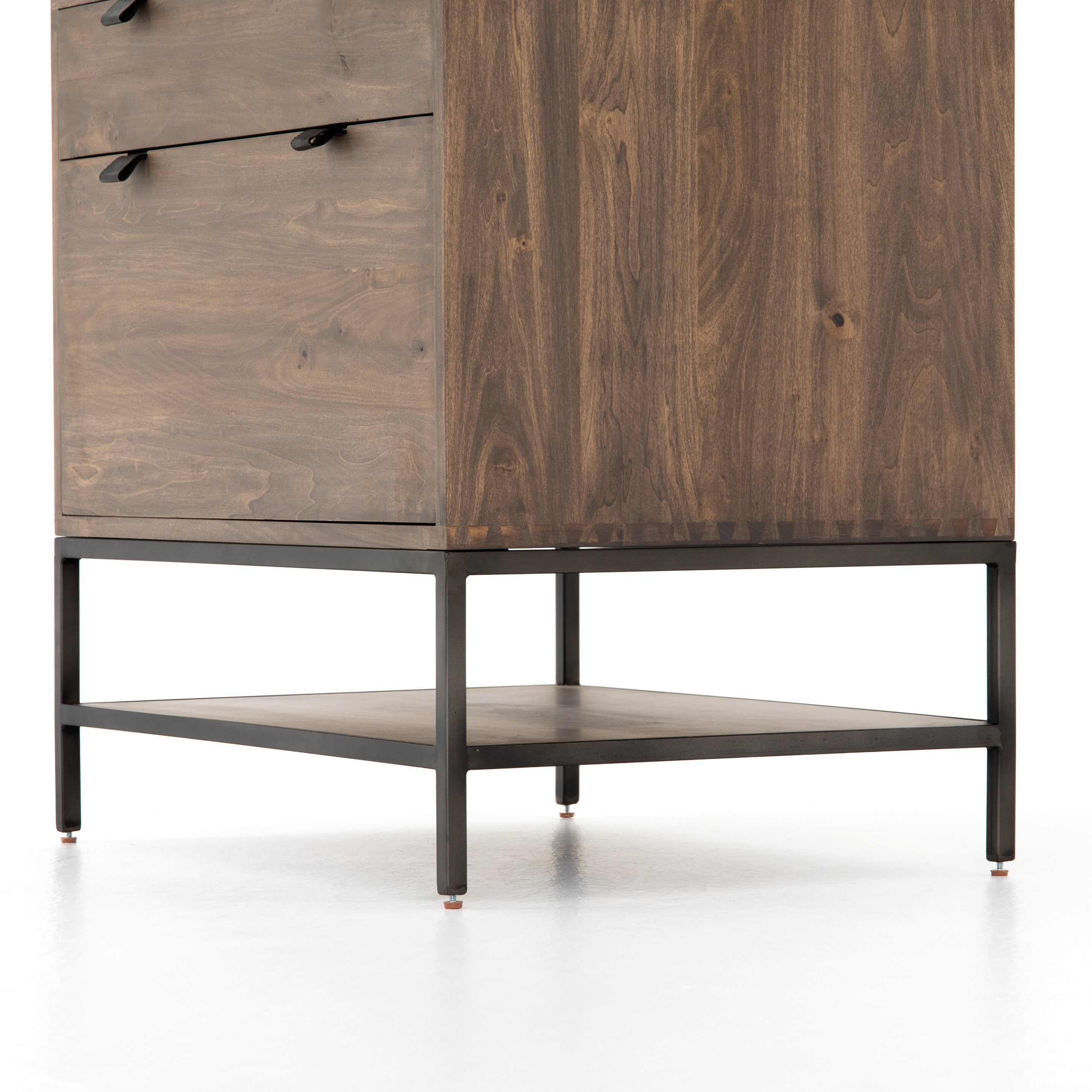 Inspired by clean mid-century design, the Trey Modular Filing Cabinet offers plenty of extra desk storage space. The cabinet is available in two colors, Auburn Poplar and a Black Wash Poplar. Metal-secured leather pulls add a textural element of surprise. Great solo or paired with matching desk or credenza.