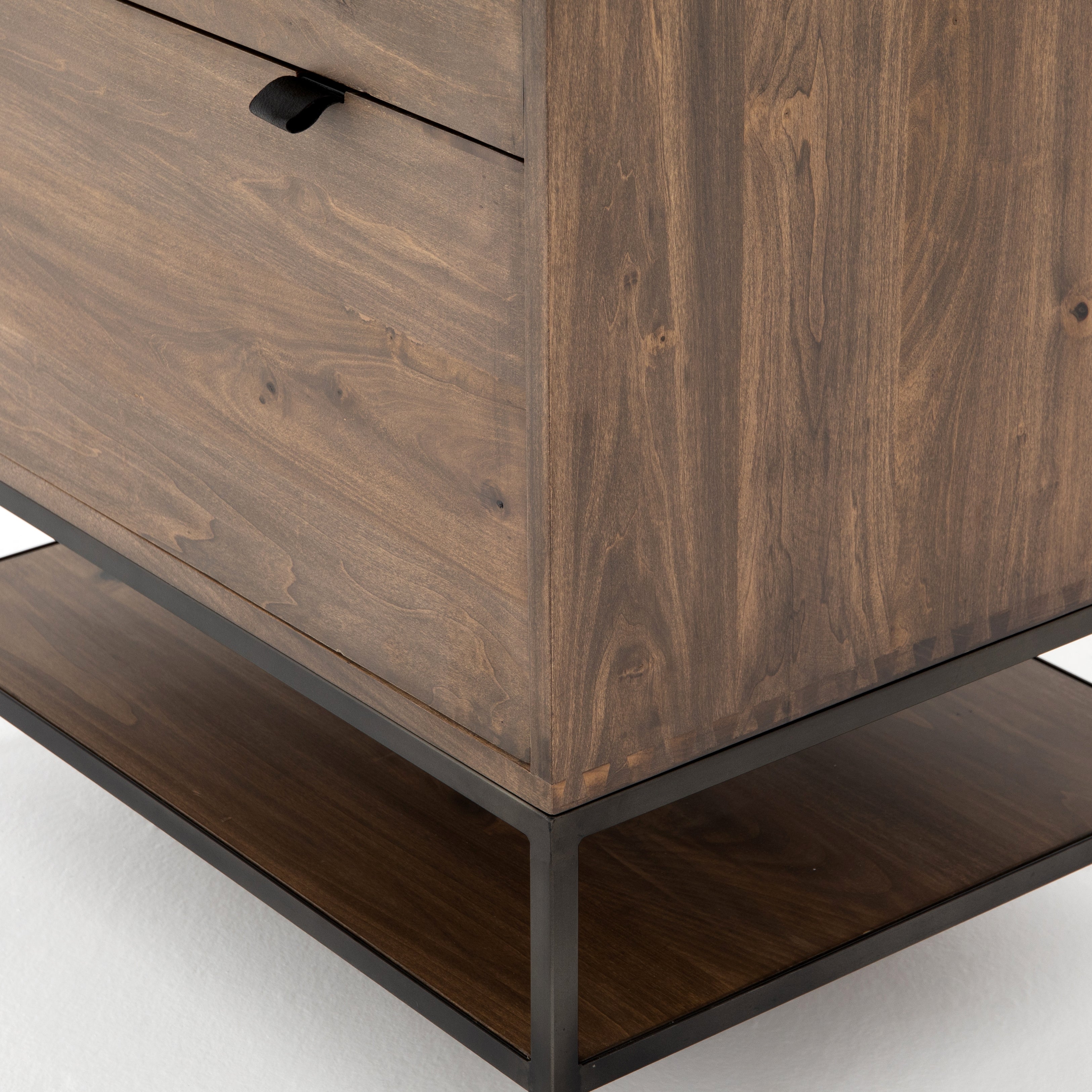 Inspired by clean mid-century design, the Trey Modular Filing Cabinet offers plenty of extra desk storage space. The cabinet is available in two colors, Auburn Poplar and a Black Wash Poplar. Metal-secured leather pulls add a textural element of surprise. Great solo or paired with matching desk or credenza.