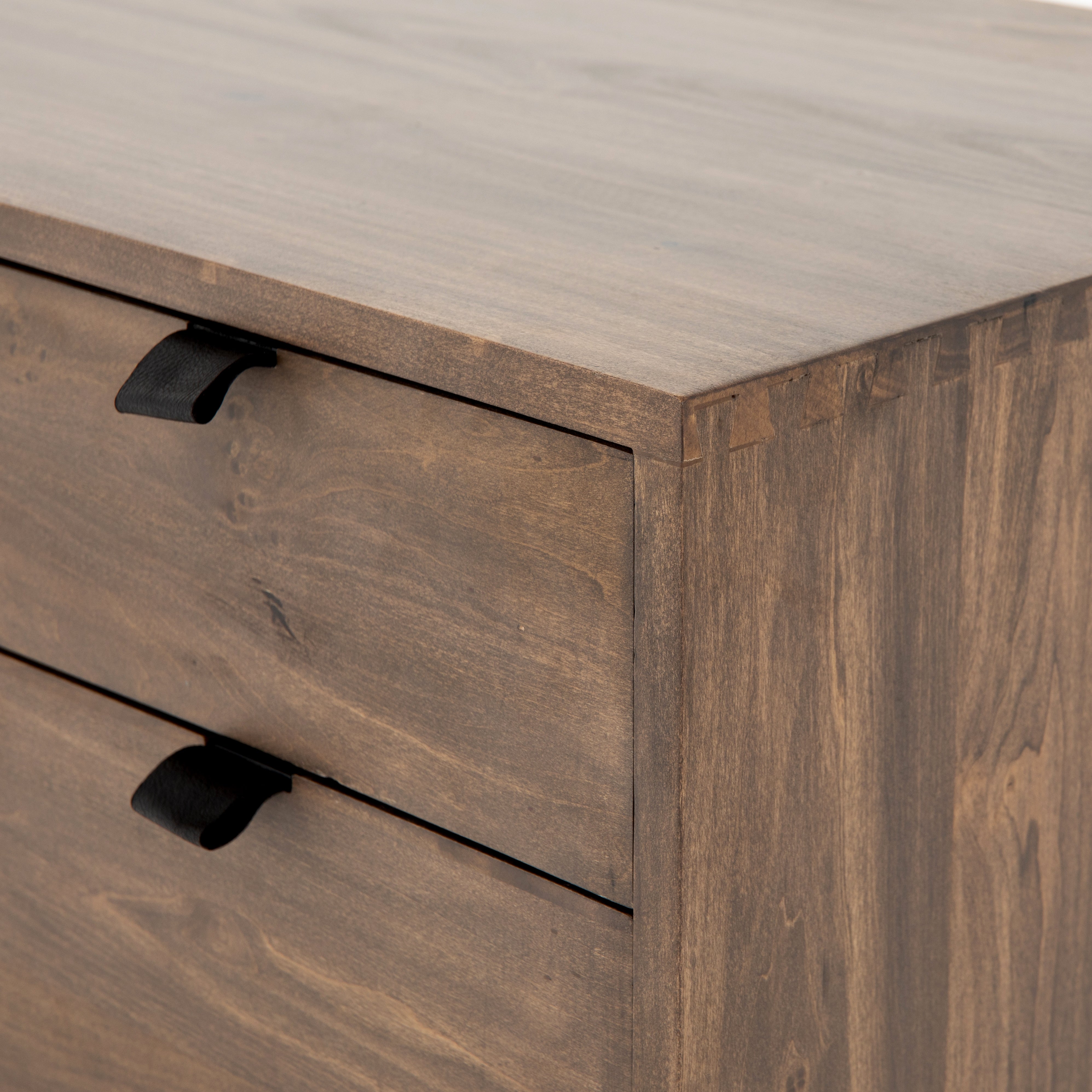 Inspired by clean mid-century design, the Trey Modular Filing Cabinet offers plenty of extra desk storage space. The cabinet is available in two colors, Auburn Poplar and a Black Wash Poplar. Metal-secured leather pulls add a textural element of surprise. Great solo or paired with matching desk or credenza.