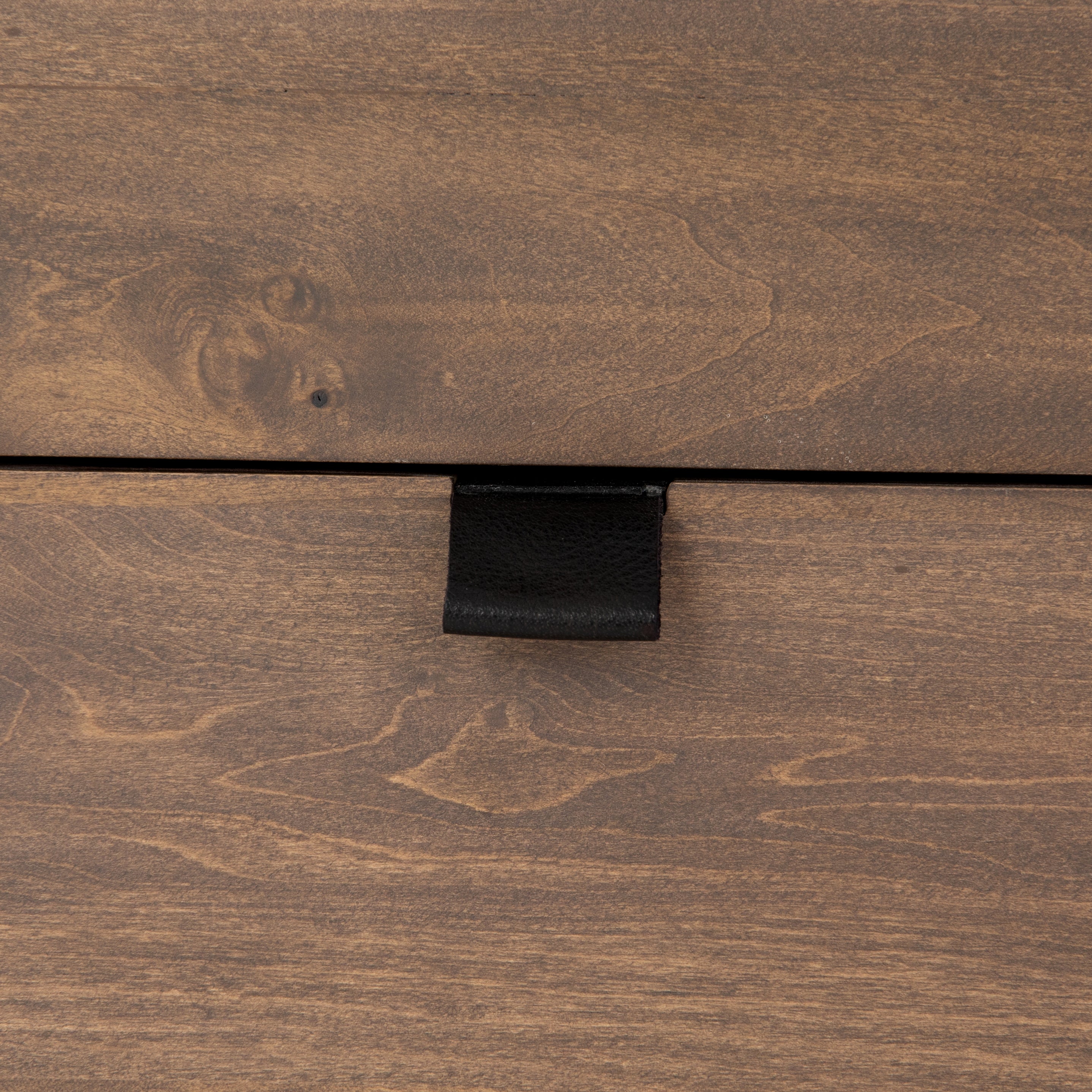 Inspired by clean mid-century design, the Trey Modular Filing Cabinet offers plenty of extra desk storage space. The cabinet is available in two colors, Auburn Poplar and a Black Wash Poplar. Metal-secured leather pulls add a textural element of surprise. Great solo or paired with matching desk or credenza.