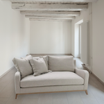 A Verellen classic, the June Sofa Family has a short back going into an attractive curved arm shape. The angled legs give us a contemporary feel and will be a family favorite for years to come. This sofa family features:  Spring down seat construction Boxed style back pillows Loose bench style seat cushion Knife edge toss pillows 5 1/2″ H wood base