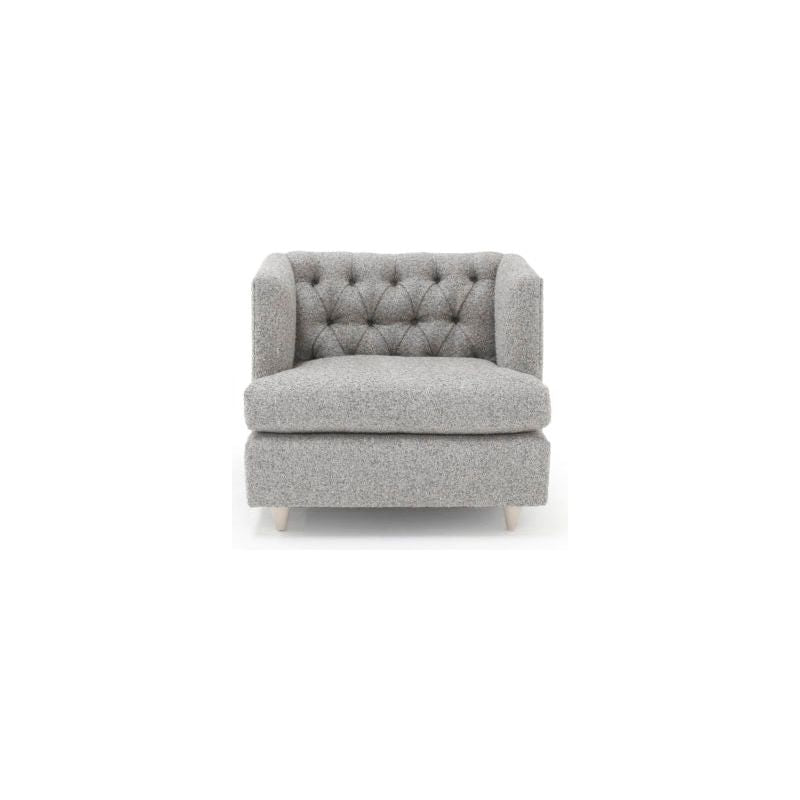 Verellen's Marilyn Sofa Family is bench-crafted in their North Carolina atelier, and features:  foam down seat construction loose boxed style seat cushion diamond tufted inside back with fabric covered ball buttons optional without tufting large and small knife edge toss pillows double needle stitch detail 4″ H conical leg