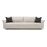 The Charlotte Sofa Family is a classic piece that gains elegance and relevance with a new minimal base. Made with a sustainably harvested hardwood frame, it comes standard with:  • upholstered and slipcovered • tight seat configuration • loose back configuration • 2″ H recessed wood base • knife edge toss
