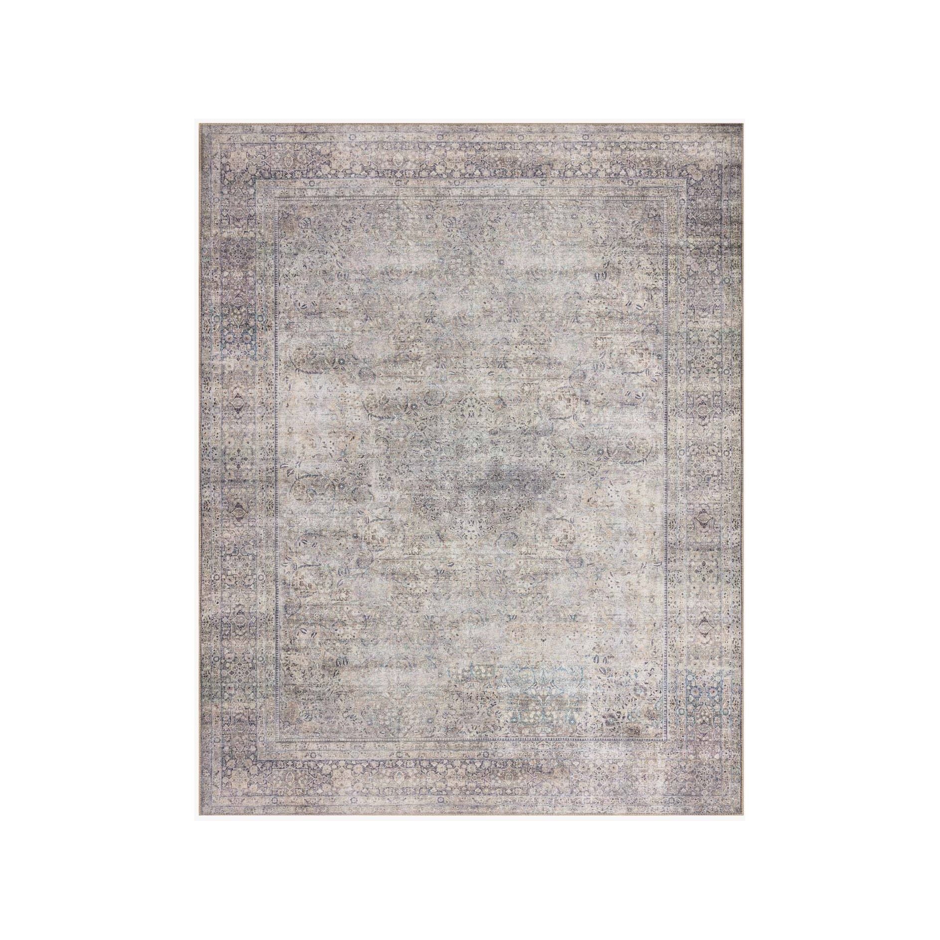 The Wynter Silver / Charcoal area rug showcases a one-of-a-kind vintage or antique area rug look power-loomed of 100% polyester. This rug brings in tones of silver, gray, blue, tan, and hints of green. The rug is ideal for high traffic areas such as living rooms, dining rooms, kitchens, hallway, and entryways.