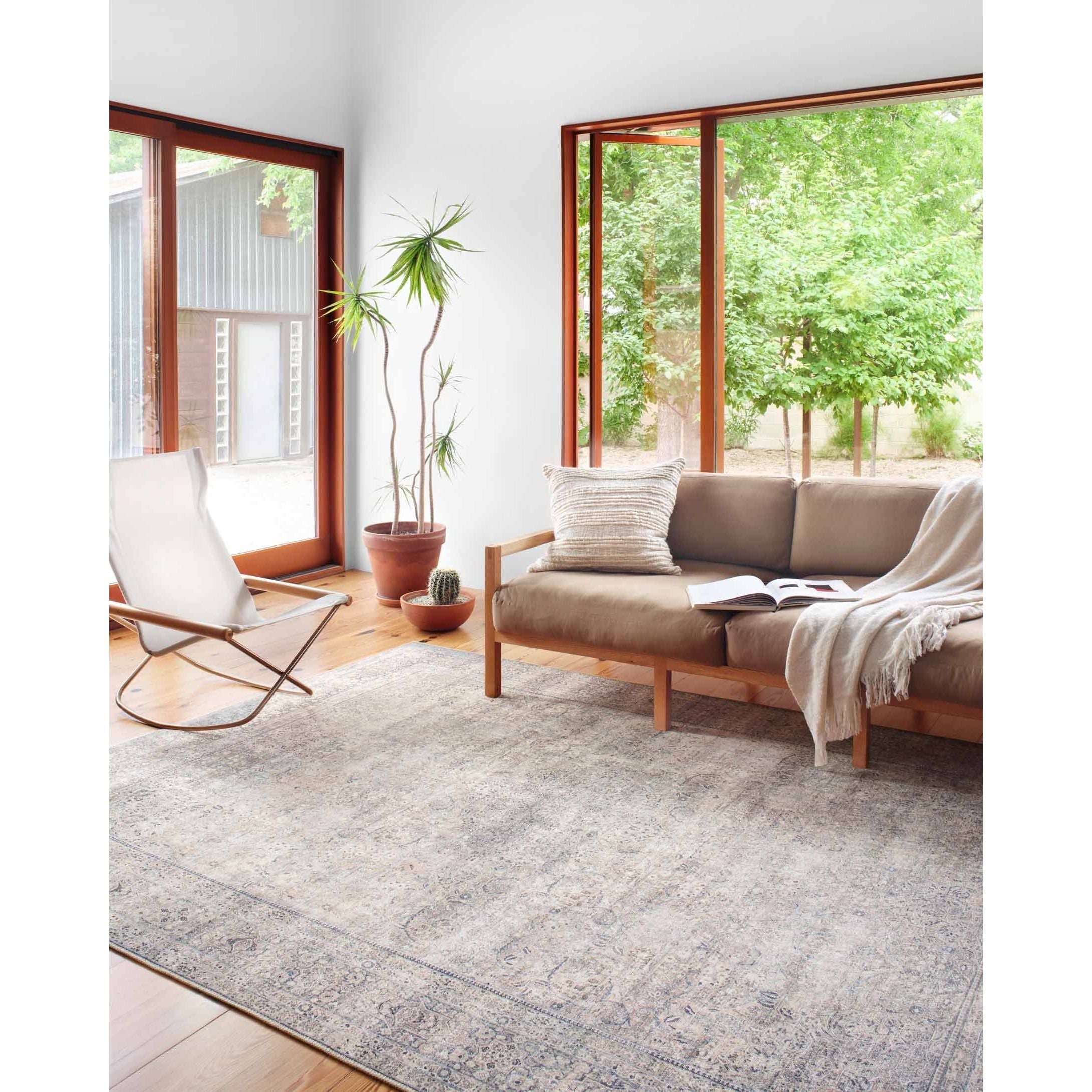 Featuring Wynter Silver / Charcoal Rug by Loloi at Amethyst Home. Old soul, new spirit. Power-loomed of 100% polyester, the Wynter Silver / Charcoal area rug showcases a one-of-a-kind vintage or antique area rug look at an affordable price. This rug brings in tones of silver, gray, blue, tan, and hints of green and ideal for high traffic areas due to th.  Amethyst Home provides interior design, new home construction design consulting, vintage area rugs, and lighting in the Laguna Beach metro area.
