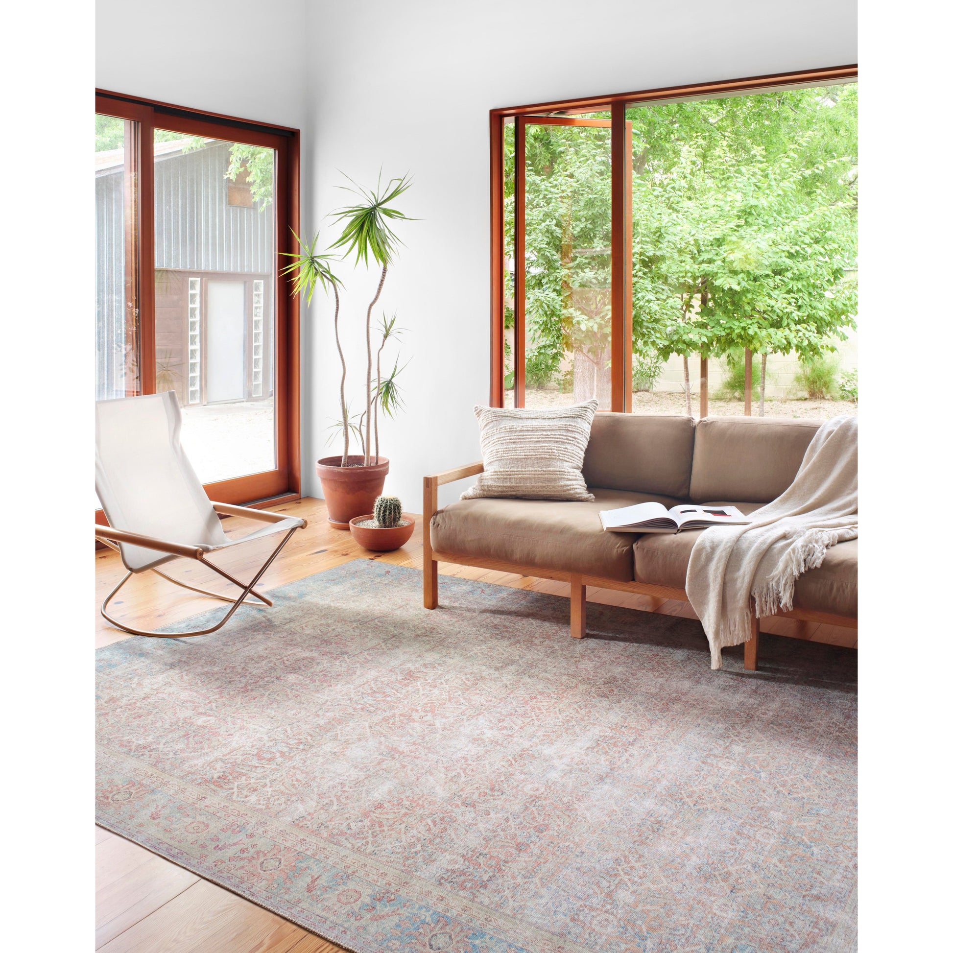 The Wynter Red / Teal area rug showcases a one-of-a-kind vintage or antique area rug look power-loomed of 100% polyester. This rug brings in tones of pink, ivory, and blue. The rug is ideal for high traffic areas due to the rug's durability for living rooms, dining rooms, kitchens, hallways, and entryways.