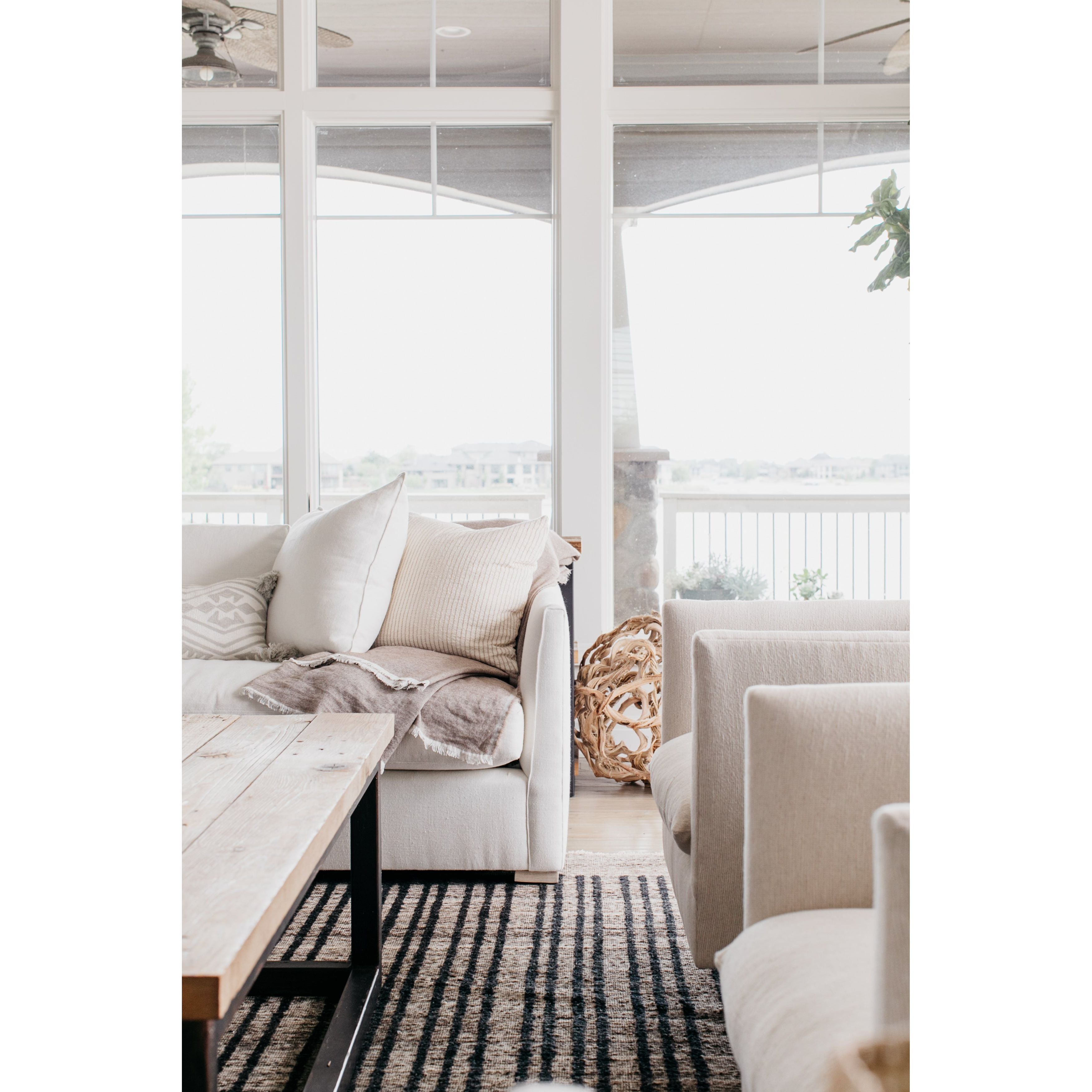 The Thibaut Sofa Family by Verellen is truly something you could lounge on all day. The 8-way hand-tied seat construction with a spring down or tight seat cushion make this comfortable on any spot on the sofa.