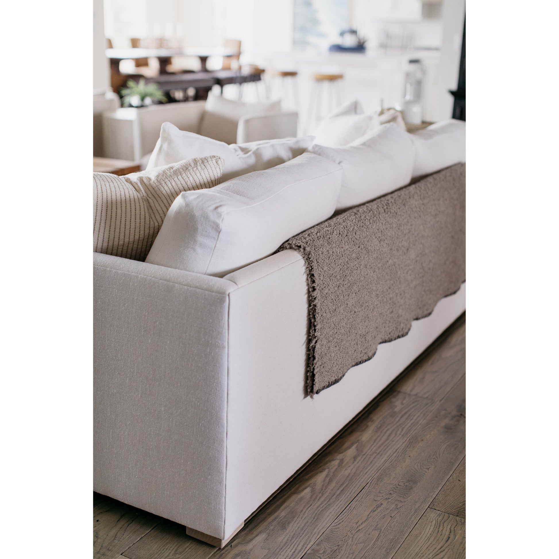 The Thibaut Sofa Family by Verellen is truly something you could lounge on all day. The 8-way hand-tied seat construction with a spring down or tight seat cushion make this comfortable on any spot on the sofa.