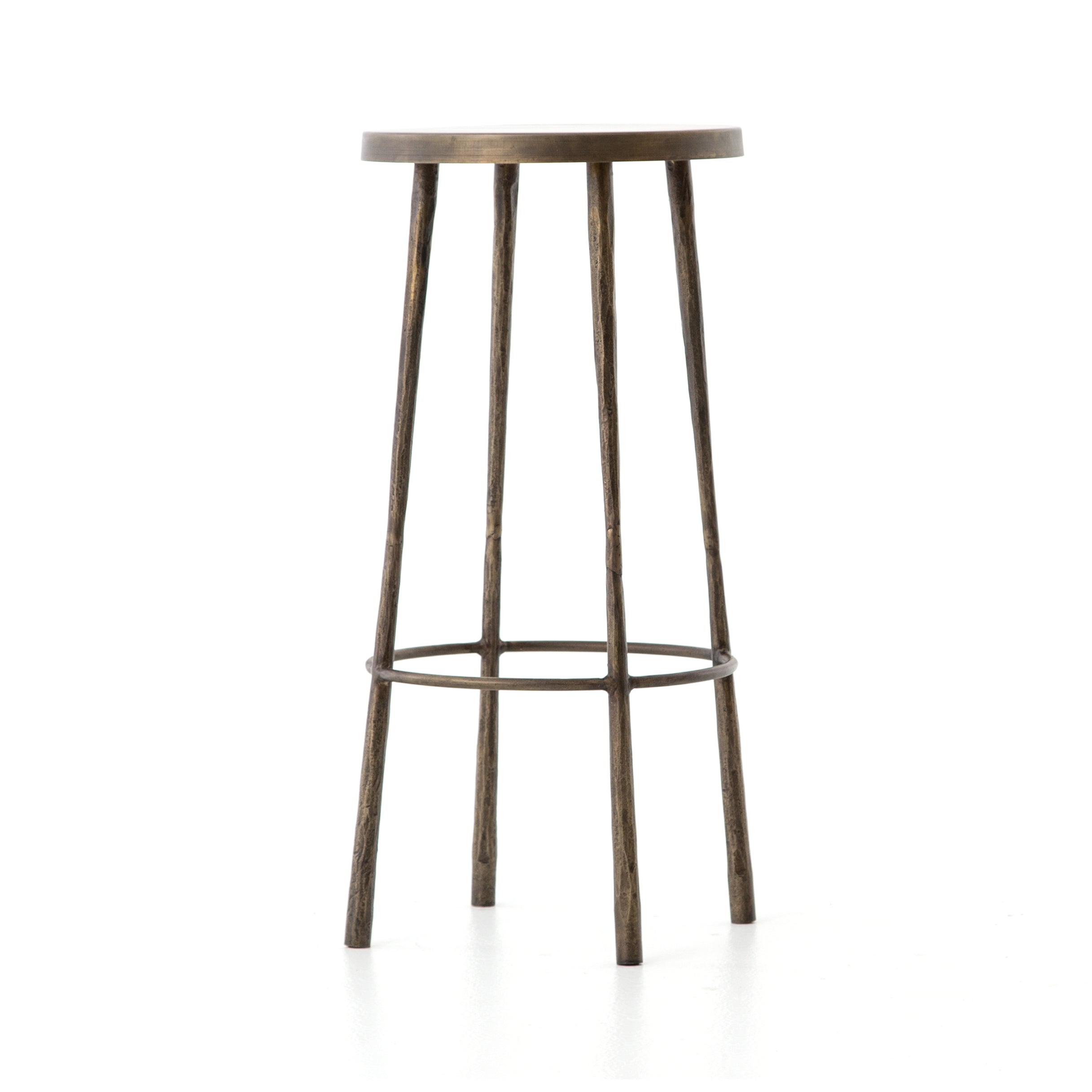 Featuring Westwood Bar + Counter Stool - Antique Brass by Four Hands at Amethyst Home. The Westwood Antique Brass Bar + Counter Stool have stunning hammered iron legs for a rich, industrial look. 
Counter Stool Overall Dimensions: 16"W x 16"L x 26.25"HSeat Depth: 14"Seat Height: 26.25"Bar Stool Overall Dimensions: 16"W x 16"L x 30"HSeat Depth: 14"Seat Height:.  Amethyst Home provides interior design, new home construction design consulting, vintage area rugs, and lighting in the Austin metro area.