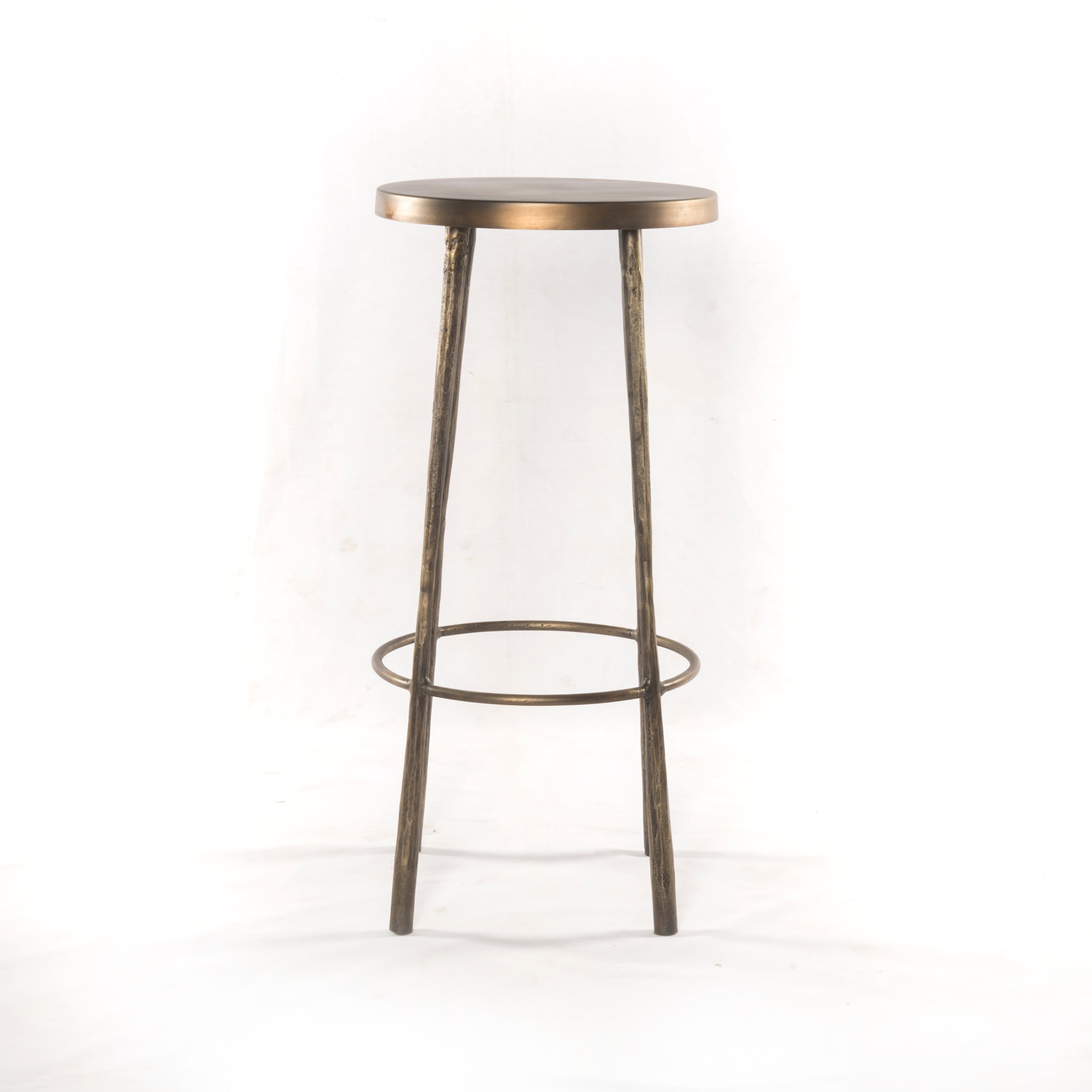 The Westwood Antique Brass Bar + Counter Stool have stunning hammered iron legs for a rich, industrial look. Amethyst Home provides interior design, new home construction design consulting, vintage area rugs, and lighting in the Boston metro area.