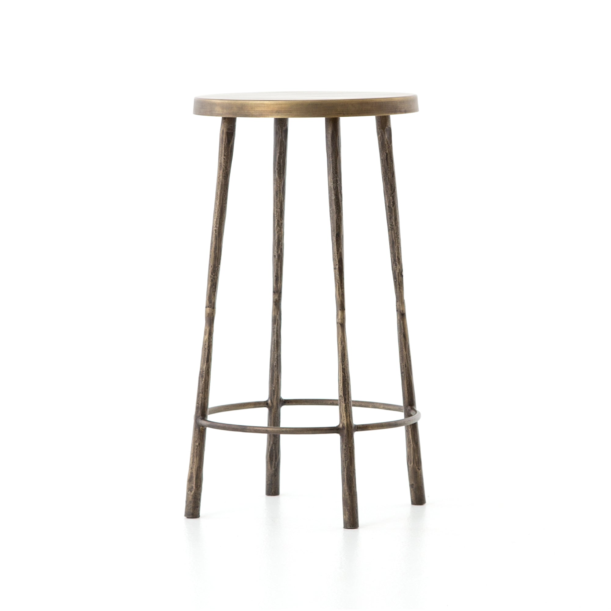 Featuring Westwood Bar + Counter Stool - Antique Brass by Four Hands at Amethyst Home. The Westwood Antique Brass Bar + Counter Stool have stunning hammered iron legs for a rich, industrial look. 
Counter Stool Overall Dimensions: 16"W x 16"L x 26.25"HSeat Depth: 14"Seat Height: 26.25"Bar Stool Overall Dimensions: 16"W x 16"L x 30"HSeat Depth: 14"Seat Hei.  Amethyst Home provides interior design, new home construction design consulting, vintage area rugs, and lighting in the Des Moines metro area.
