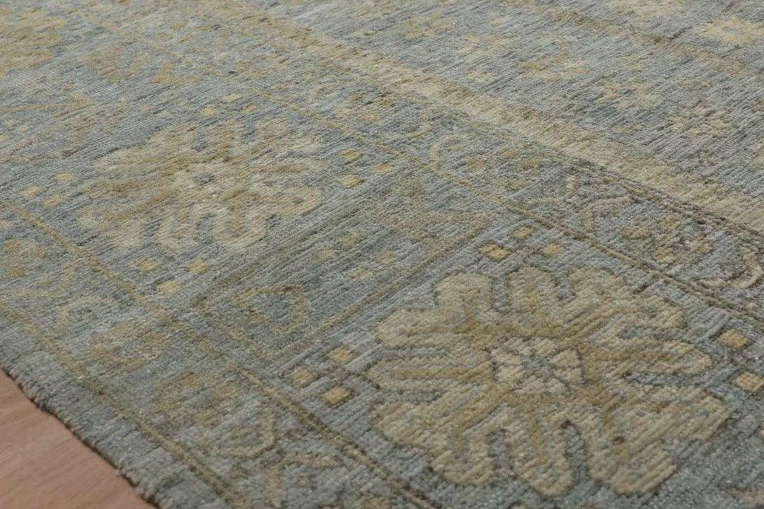 Load video: The Legacy Ocean rug from Loloi is hand-knotted, refined, yet versatile for any home. The Legacy rug is deliberately distressed and sheared down to an extra low pile of 100% wool, creating a patina usually only imparted through decades of wear.  This rug features: - Beautiful vintage look and patina - Extra low pile - Easy to clean and maintain - Perfect for living and dining rooms, hallways, and extra large spaces  Hand-Knotted 100% Wool LZ-03 Ocean