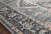 Featuring soft motifs in a carefully curated color palate of black, blue, yellow, and hints of orange, the Hathaway Navy / Multi area rug captures the essence of one-of-a-kind vintage or antique area rug at an attractive price.