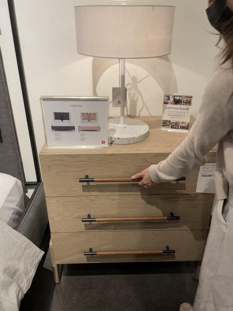 The light-finished oak of this Rosedale 3 Drawer Dresser brings a clean, brightness to any room. We love how the three spacious drawers have iron hardware wrapped in a gorgeous, tan leather. The dimension legs with iron connecting them bring a unique look to your bedroom or other area!  Overall Dimensions: 32.50"w x 19.50"d x 32.50"h