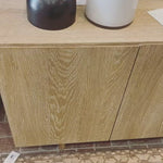 We love the grained matte finish on this Mika Washed Oak Veneer Dining Sideboard. The shelves make this the perfect sideboard for a functional, modernly attractive piece to add to your dining room  Size:  72.00"w x 16.00"d x 30.00"h