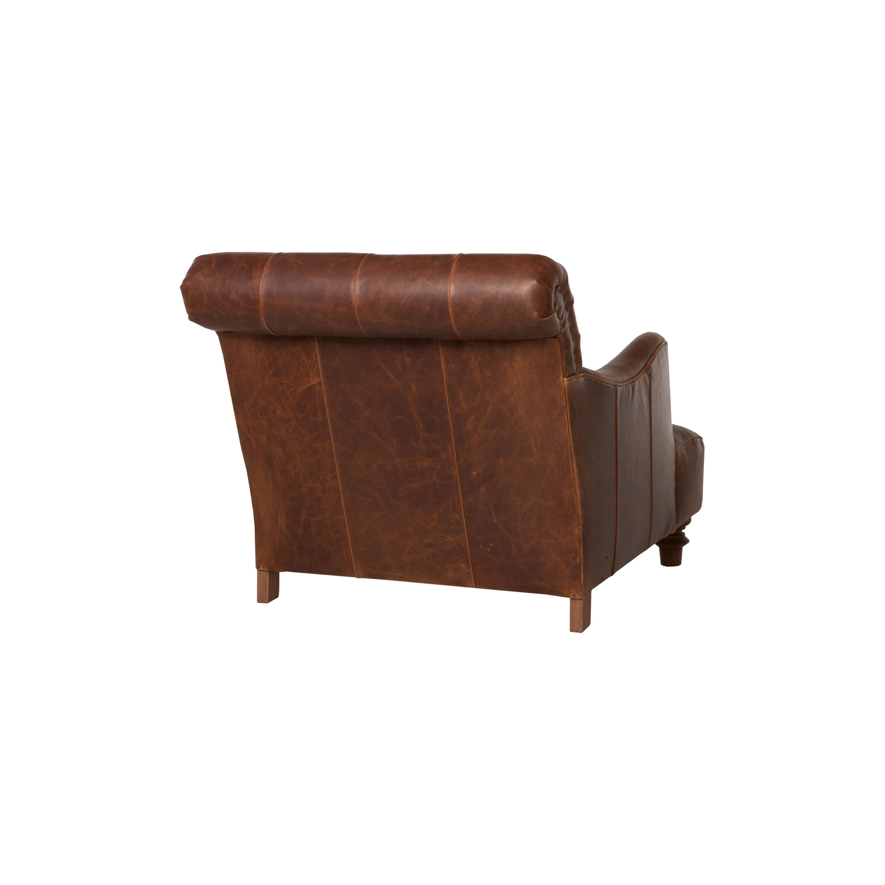 The Acacia Chair by Cisco Brothers was love at first sight & sit!  A firm, comfortable seat with gentle recline is the perfect seat for conversation and relaxation.  As shown upholstered in Spur Terracotta.  33"w x 32"h x 42"d  Seat Space: 22"w x 28.5"d x 16"h