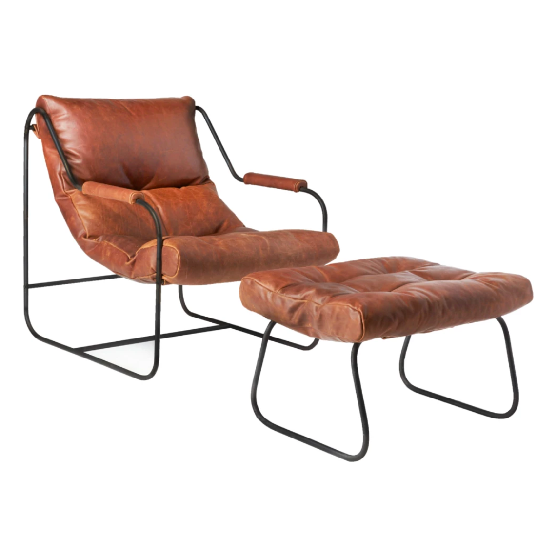 Like "sitting in an American baseball glove" -- the Brando Leather Chair Set from Cisco Brothers was love at first sit in this unique chair! We compare the feel to sitting in a hammock. As shown in Spur Terracotta, Grade 500 leather.  Size: 27"w x 36"d x 32"h Seat space: 25"w x 19"d x 17.5"h Ottoman: 25"w x 20"d x 16.5"h