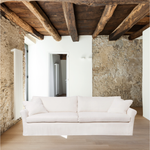 This is not your traditional roll-arm sofa. The Beverly Sofa from Cisco Brothers has a scaled-down roll arm for a more subtle style, allowing it to fit comfortably with any living room ensemble. Shown in fabric Brevard Ivory.  All pieces are priced with a feather cloud package unless otherwise noted.   Overall dimensions: 96"w x 41"d x 32"h Seat Space: 84"w x 24"d
