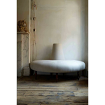 This JD Coin Half Upholstered Sofa by Cisco Home is an elegant statement in a foyer, striking in a master closet, or a perfect transition in living spaces. A nod to the glamour of old hotels with a fresh, modern perspective!  Overall: 60"w 30"d 39"h