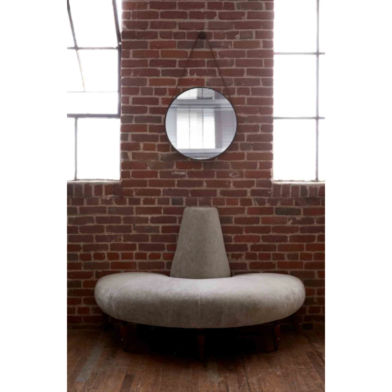 This JD Coin Half Upholstered Sofa by Cisco Home is an elegant statement in a foyer, striking in a master closet, or a perfect transition in living spaces. A nod to the glamour of old hotels with a fresh, modern perspective!  Overall: 60"w 30"d 39"h