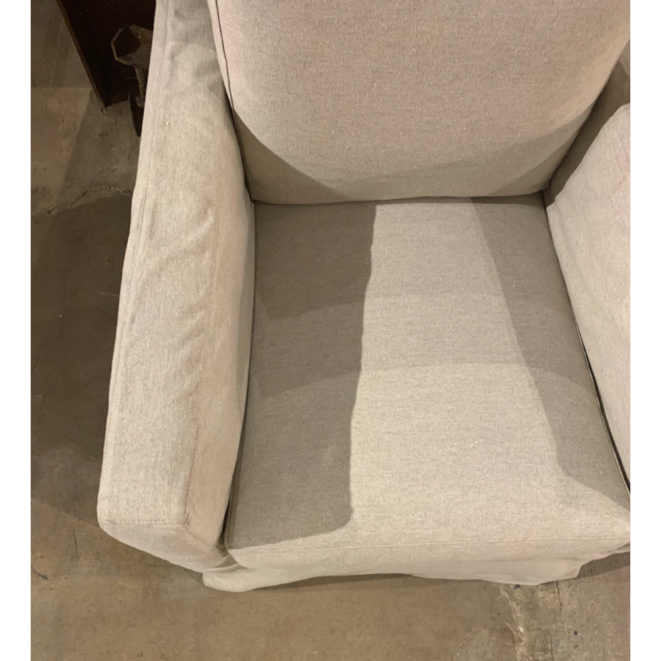 The Louis Chair by Cisco Brothers has an engaging profile and a sheltering, narrow seat. This design combines modern and coastal aesthetics with clean lines, a straight skirt, and a subtle 2" slit.A classic style with a scale that suits any living room or lounge area. Photographed in Logan Oatmeal. Lifestyle in Logan Grey. Amethyst Home provides interior design, new home construction design consulting, vintage area rugs, and lighting in the Kansas City metro area.