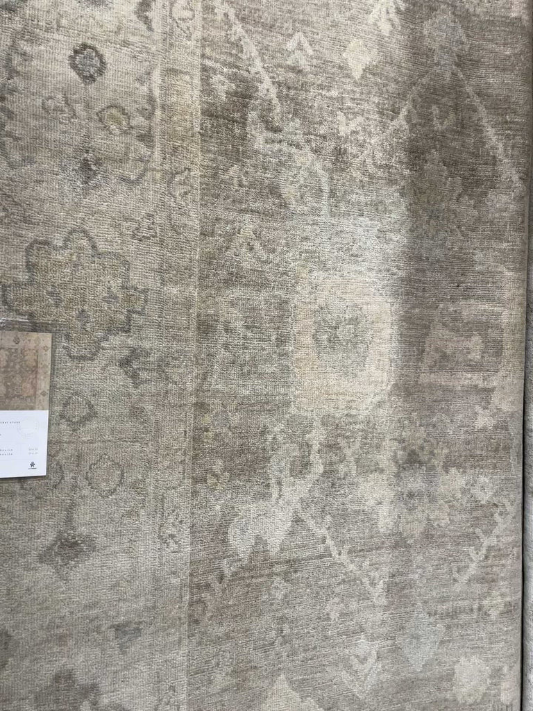 Hand-knotted in India of 100% wool by skilled artisans, the Vincent Moss Gray / Stone Area Rug offers the look of a well-worn antique rug in a modern-day color palette. Each exquisite piece undergoes a weeks-long antique washing process which fades the pattern and color beautifully. And with sizes ranging from 2 x 3 to 13 x 19, Vincent fits right at home in any elegant room setting.  Hand-Knotted 100% Wool VC-02 Moss Gray / Stone