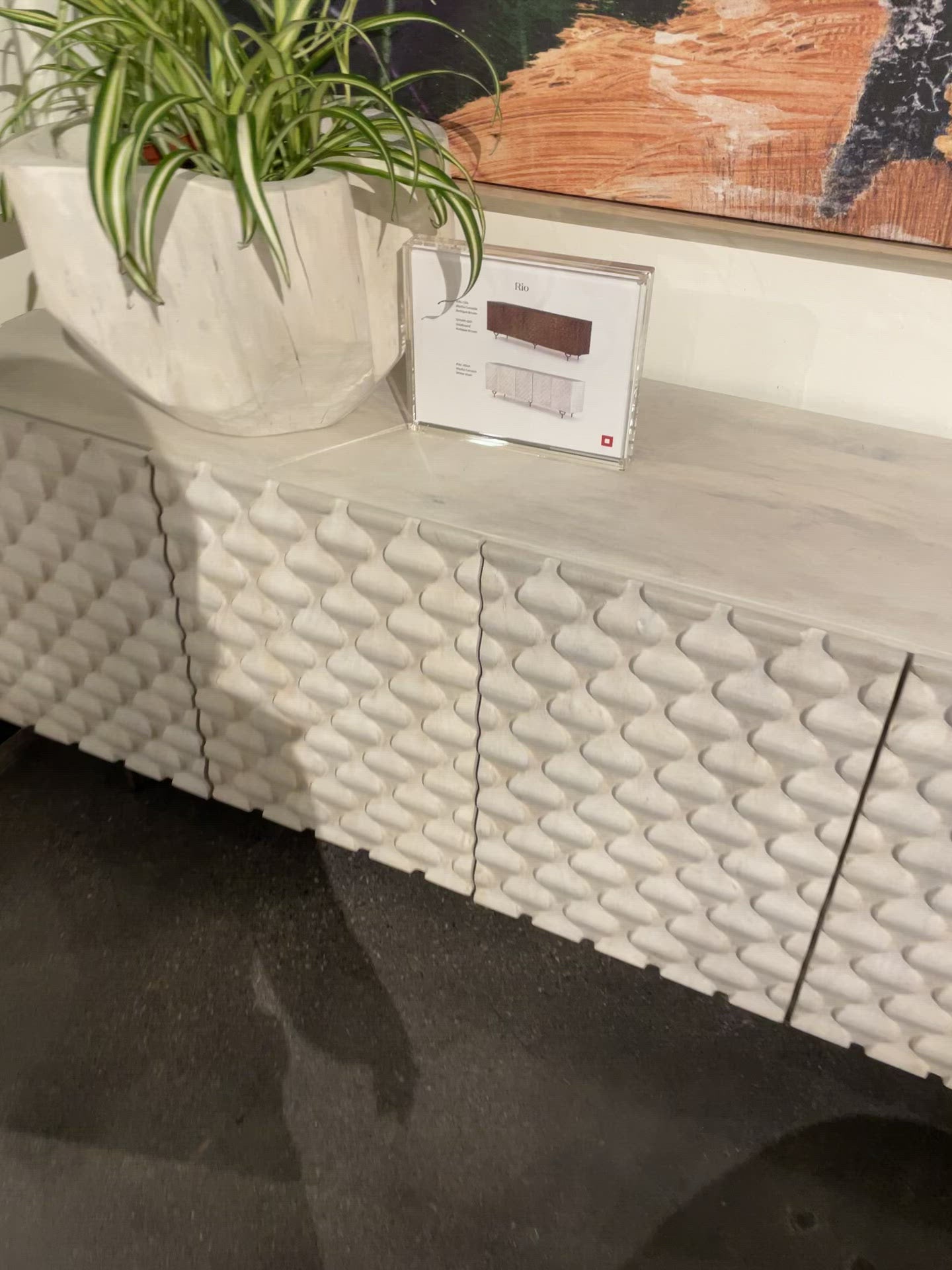 We love the texture of this Rio Media Console - Round Cut White Wash. Made from solid mango with spacious interior shelving and a rear cutout for card management, this is a beautiful piece to add to any living room or entertainment area.   Overall Dimensions: 82.00"w x 18.25"d x 28.00"h
