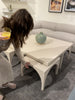 Meet a forward-thinking oak coffee table as stylish as it is functional with this Amara Coffee Table. We love the beautifully arched sides with four separate nesting tables that slide out to create ample extra surfaces as needed, tucking back under with ease.  Overall Dimensions: 47.25"w x 47.25"d x 18.00"h