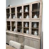 Featuring Haley Cabinet by Dovetail at Amethyst Home. The Haley Cabinet has ample storage, with glass door panels opening to shelves and a bottom sliding door that opens to more shelves. Made from reclaimed pine with a white wash grey sealed finish, this brings an antique feel to any room.

Reclaimed Pine 

White Wash Grey Sealed Finish

Flat Glass Door Pan.  Amethyst Home provides interior design, new home construction design consulting, vintage area rugs, and lighting in the Portland metro area.