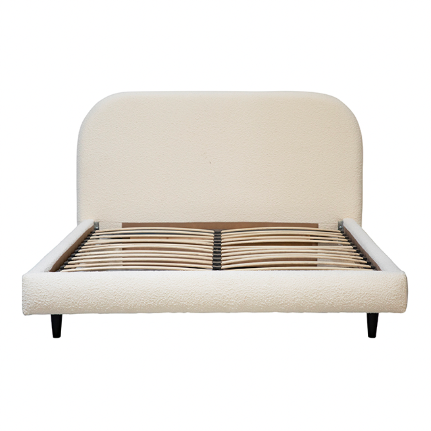 We love the rounded edges of this Marlene Bed. The off white boucle brings a textured, warm look to any bedroom.  Linen with Pine Wood Frame Off White Boucle Upholstery with Black Wood Legs 