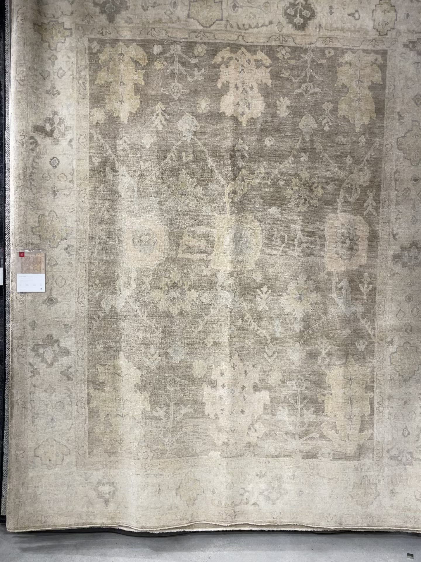 Hand knotted of 100% wool by skilled artisans, the Loloi Vincent Moss Gray /Stone Area Rug, or VC-02, offers the look of a well-worn antique rug in a modern day color palette. Each exquisite piece undergoes a weeks-long antique washing process which fades the pattern and color beautifully. 