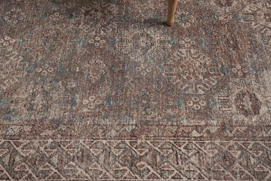 Touting richly saturated colors and a distressed pattern, the Billie Collection captures the look of a well-worn antique rug at a remarkable value. Reminiscent of one-of-a-kind rugs, this Amber Lewis x Loloi collection features random variations in color that render no two pieces exactly alike, creating up to 30% variance in color. BIL-04 AL Aqua / Rust