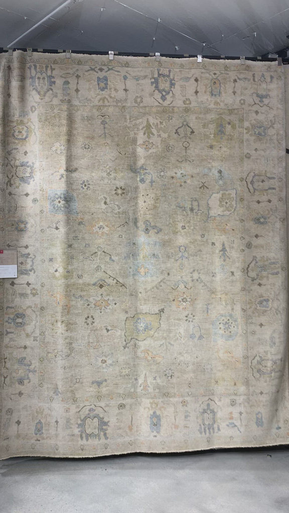 Hand knotted of 100% wool by skilled artisans, the Loloi Vincent Dune / Stone Area Rug, or VC-03, offers the look of a well-worn antique rug in a modern day color palette. Each exquisite piece undergoes a weeks-long antique washing process which fades the pattern and color beautifully. 